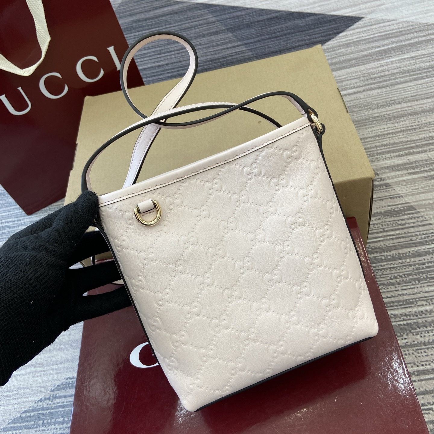 Gucci Emblem Mini Bucket Bag Light Pink Gucci Print Embossed Leather 1 i1756271400935 9320 0 4