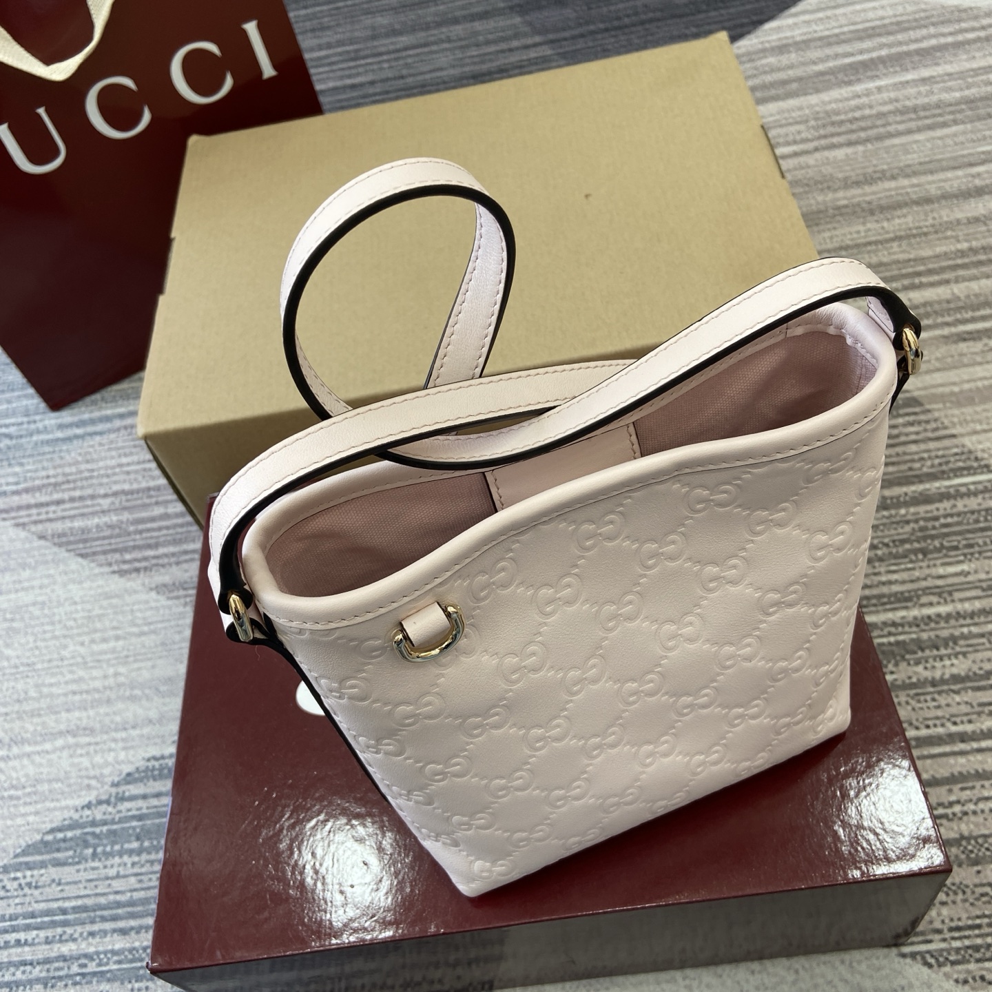 Gucci Emblem Mini Bucket Bag Light Pink Gucci Print Embossed Leather 5 i1756271400959 8663 0 3