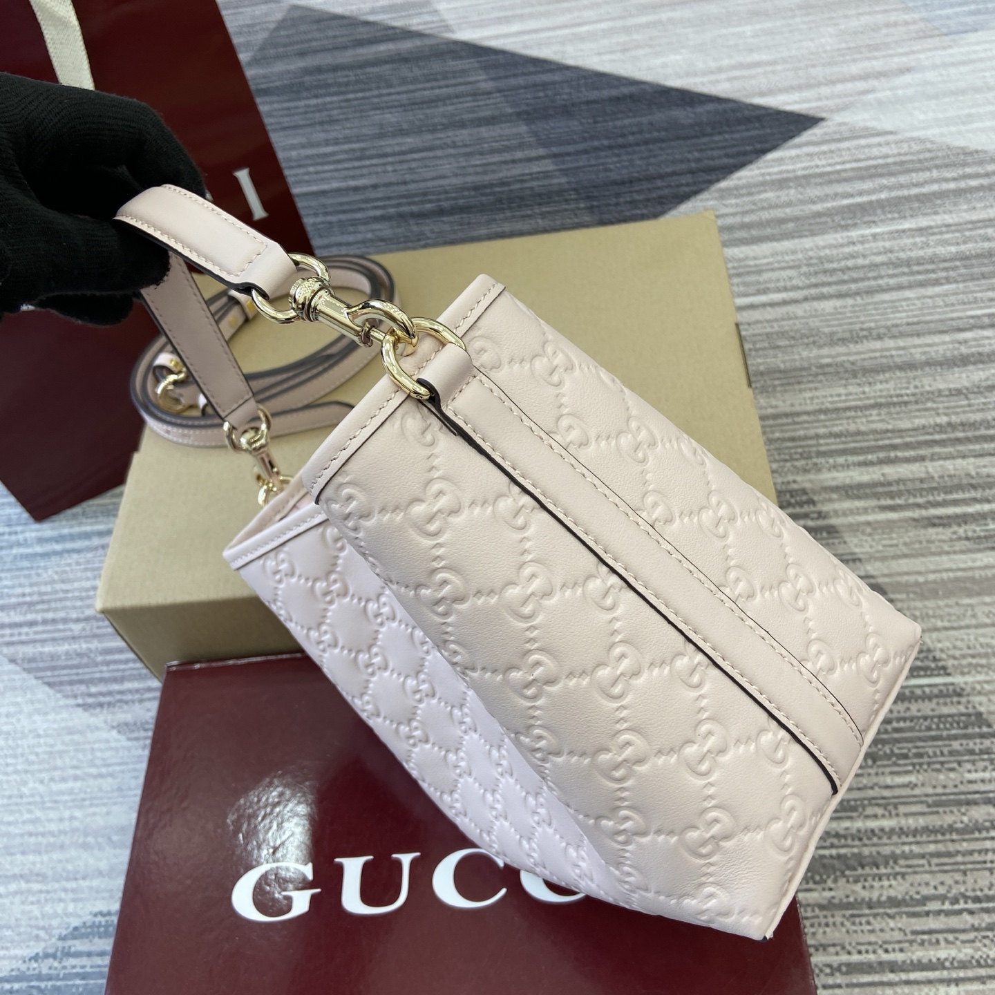 Gucci Emblem Embossed Leather Bucket Bag with Adjustable Strap, Light Pink 4 i1756271405691 8596 0 2