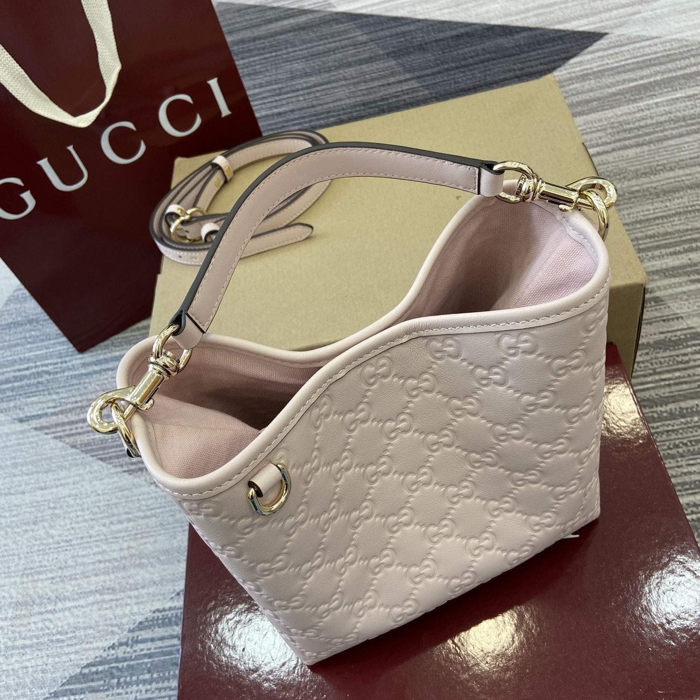 Gucci Emblem Embossed Leather Bucket Bag with Adjustable Strap, Light Pink 6 i1756271405806 2985 0 4
