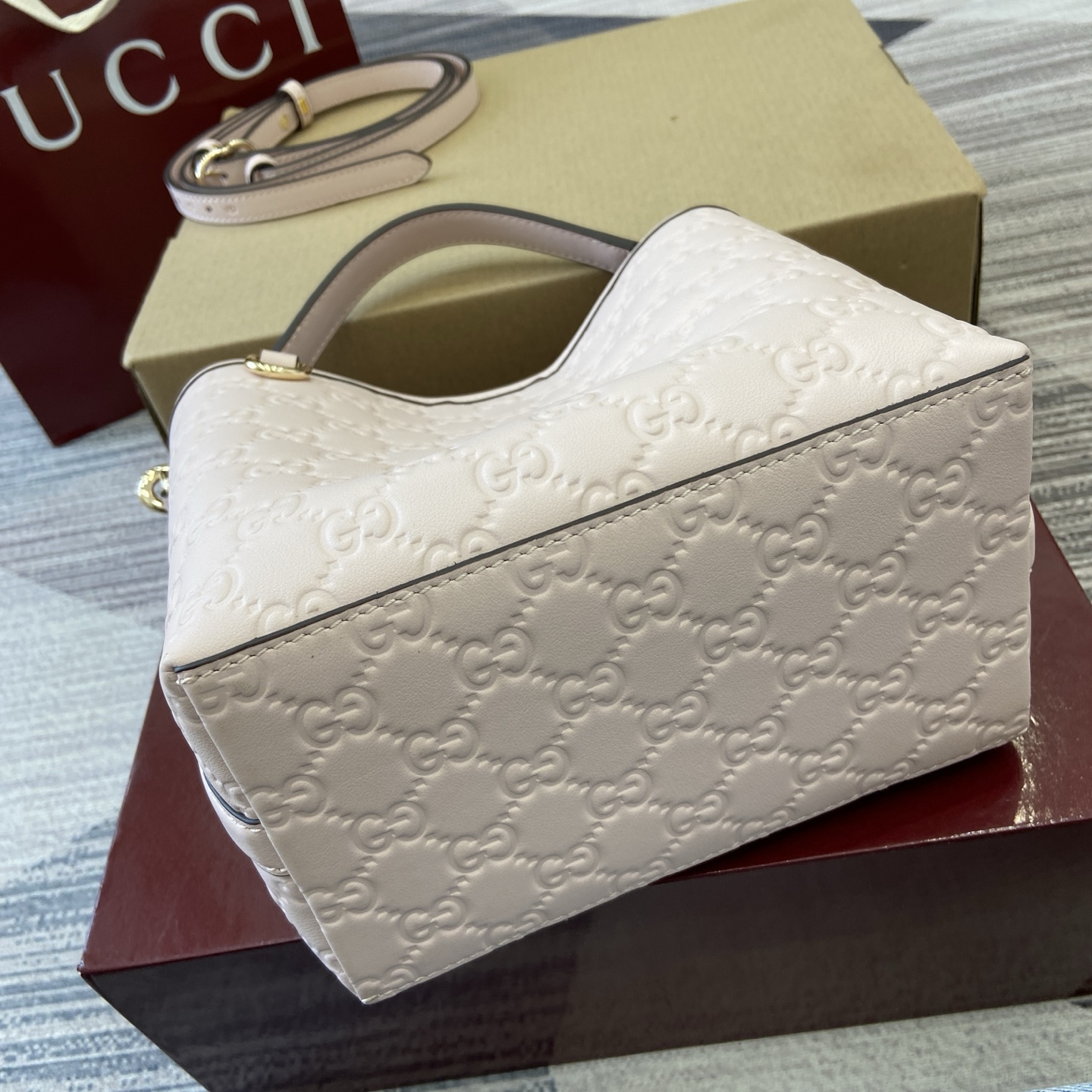 Gucci Emblem Embossed Leather Bucket Bag with Adjustable Strap, Light Pink 8 i1756271405810 7498 0 7