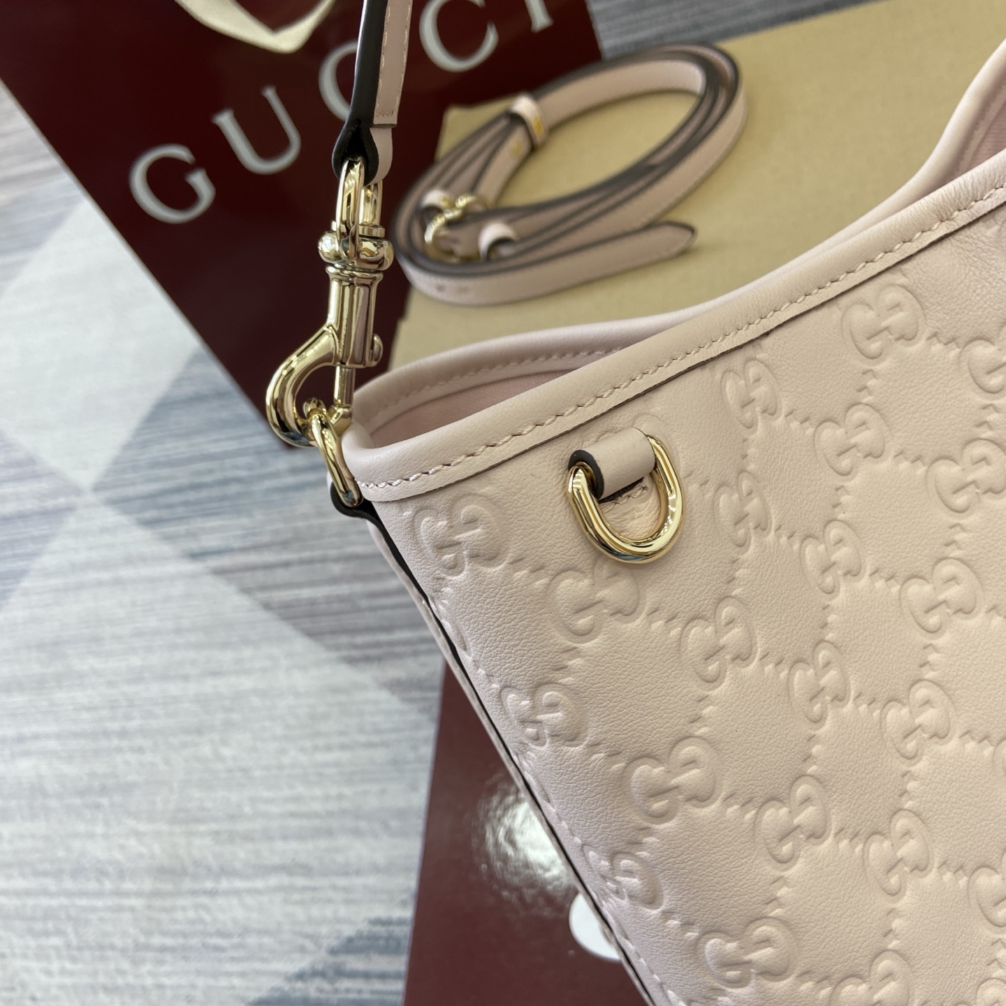 Gucci Emblem Embossed Leather Bucket Bag with Adjustable Strap, Light Pink 7 i1756271410805 6909 0 6