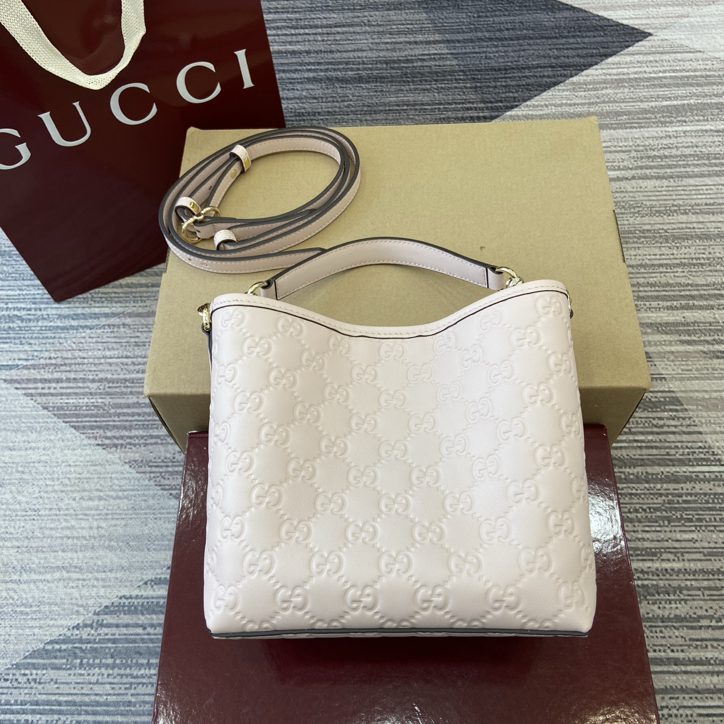 Gucci Emblem Embossed Leather Bucket Bag with Adjustable Strap, Light Pink 3 i1756271412516 5684 0 1