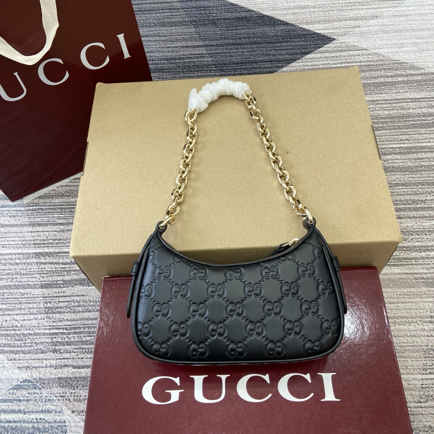 Gucci Emblem Black Embossed Leather Small Shoulder Bag with Chain Strap 4 i1757309065091 6518 0 1