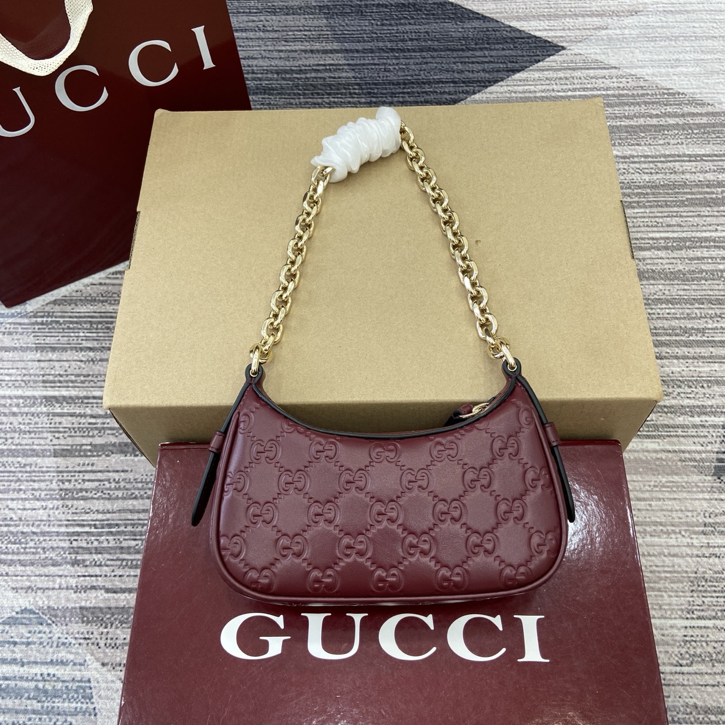 Gucci Emblem Small Shoulder Bag in Ankara Red Embossed Leather with Chain Strap 4 i1757309071703 3526 0 1