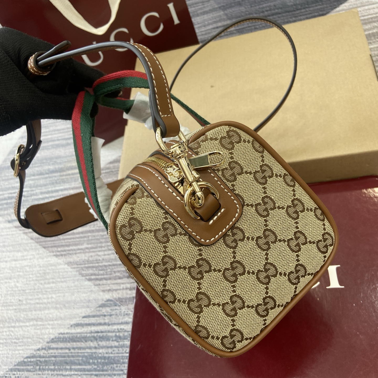 Gucci Mini Duffle Bag Beige and Brown GG Canvas with Web Stripe Detail 4 i1758362495131 3651 0 2