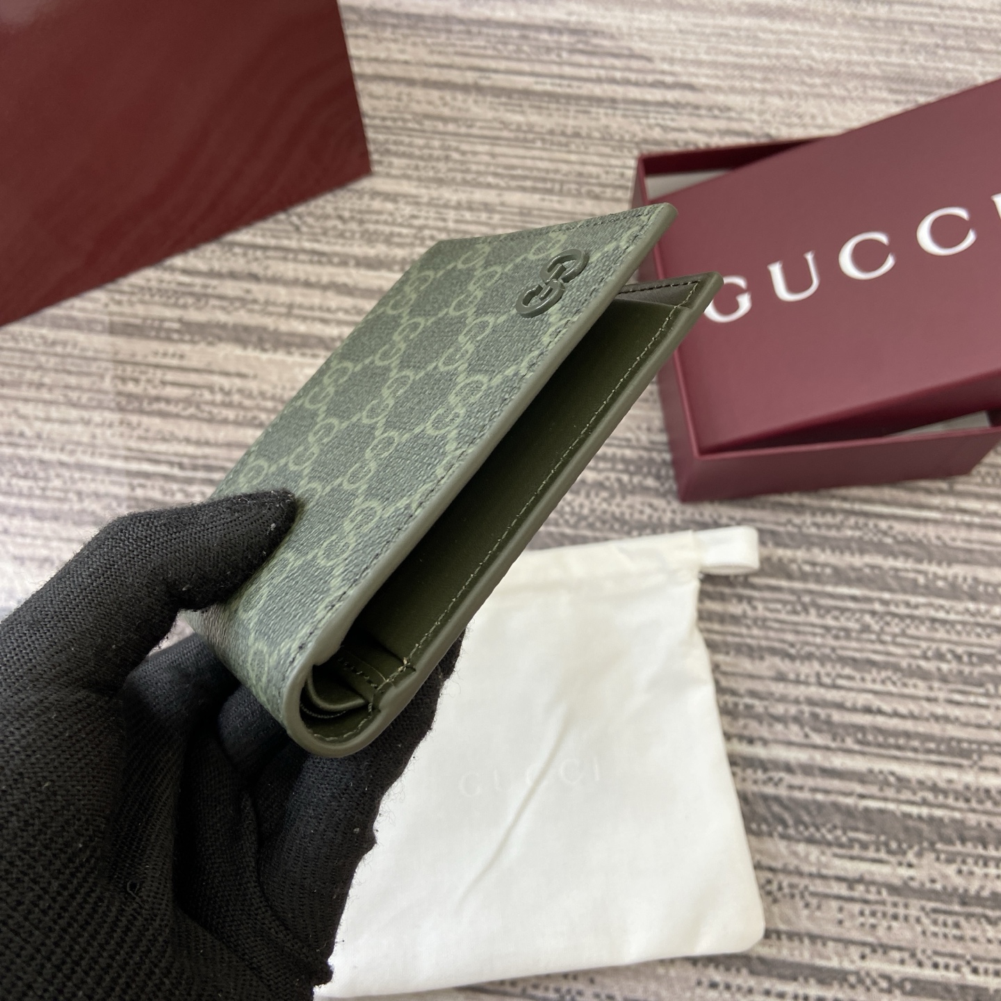 Gucci Supreme Canvas Bi-Fold Wallet with Green Leather Trim 3 i1758362963783 8877 0 2