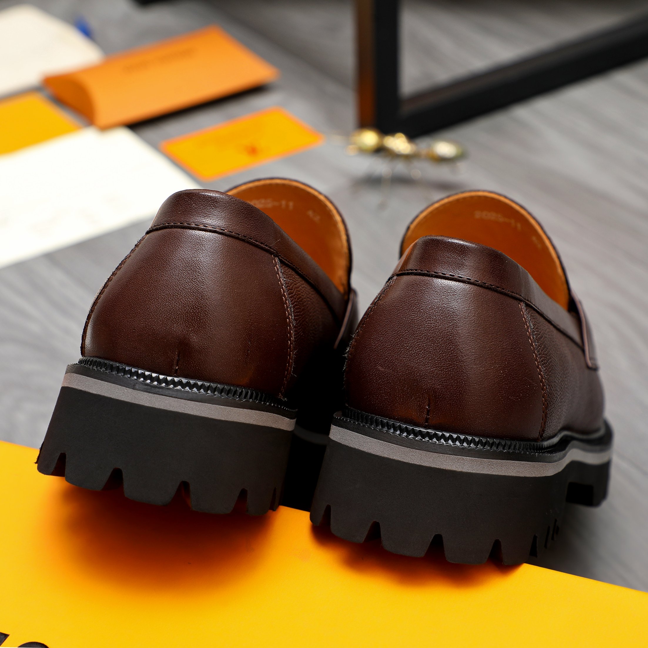 Louis Vuitton Business Casual Leather Loafers in Black and Brown 11 a1744098235777 3361