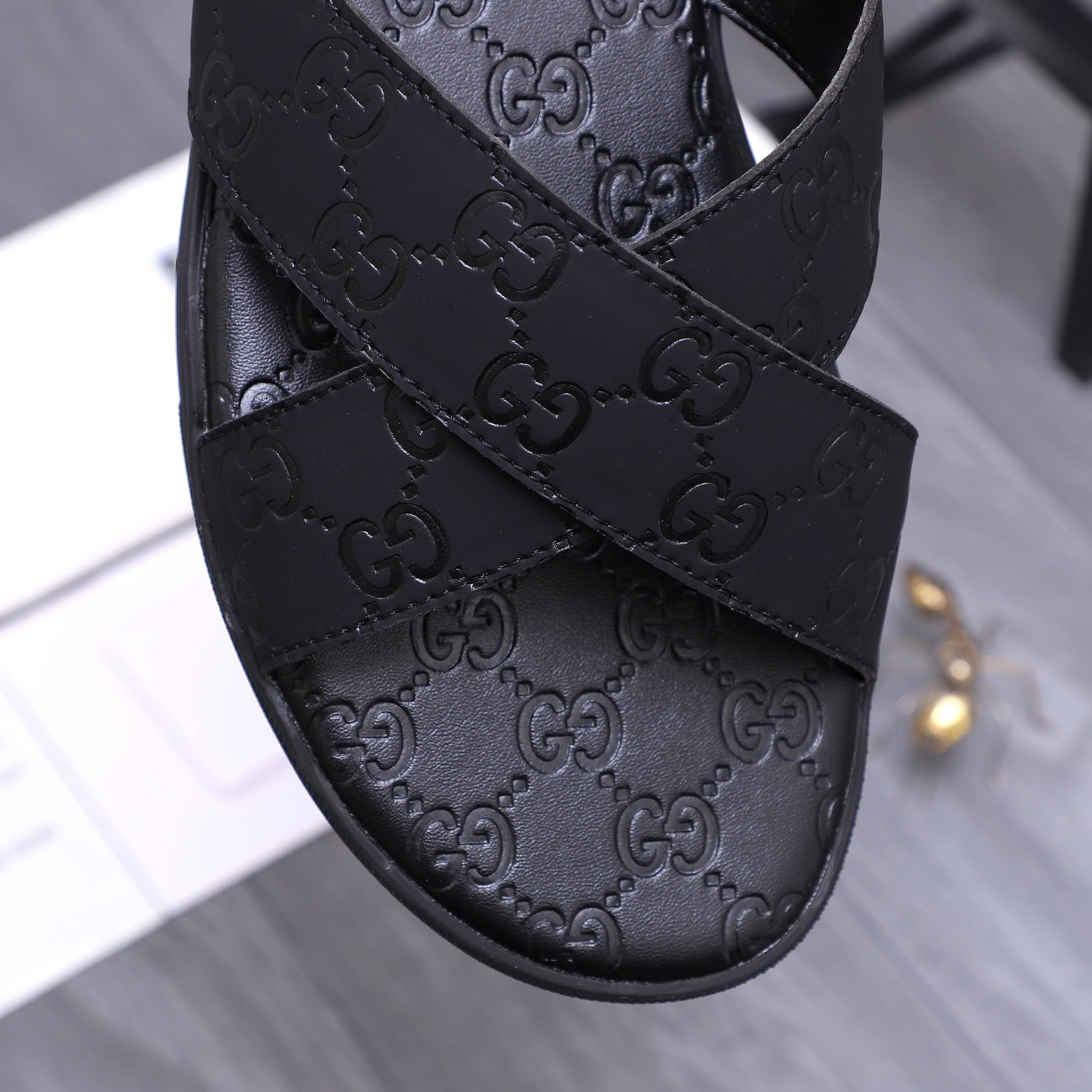 Gucci Men's Black Leather GG Embossed Cross Strap Slide Sandals 9 a1744356080907 4662