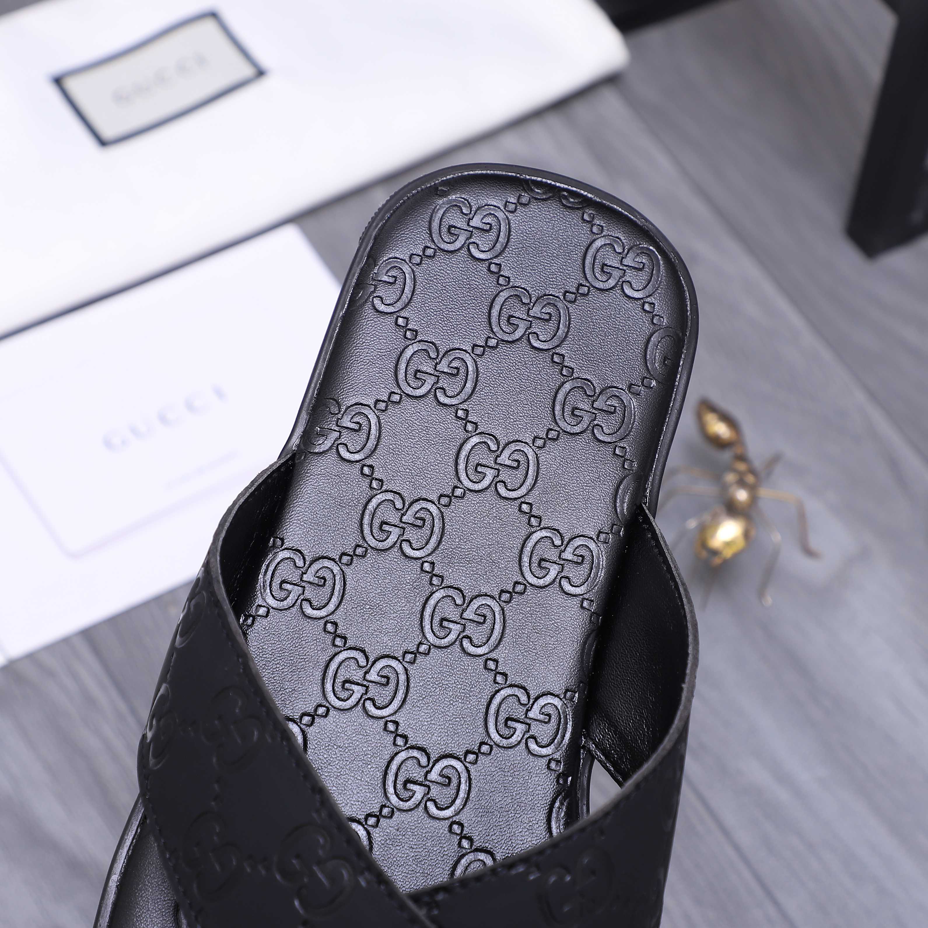 Gucci Men's Black Leather GG Embossed Cross Strap Slide Sandals 10 a1744356081198 1461