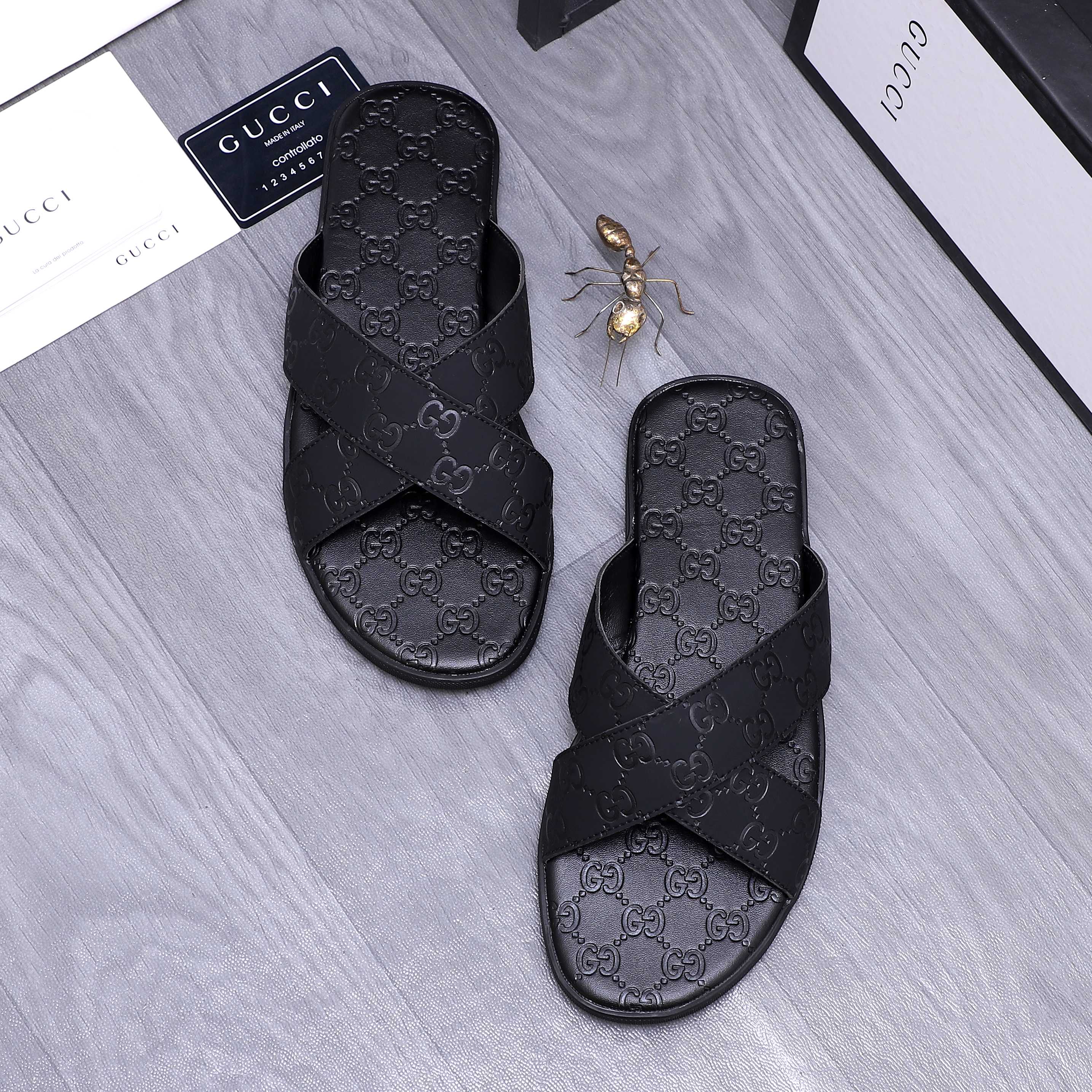 Gucci Men's Black Leather GG Embossed Cross Strap Slide Sandals 2 a1744356081282 7418