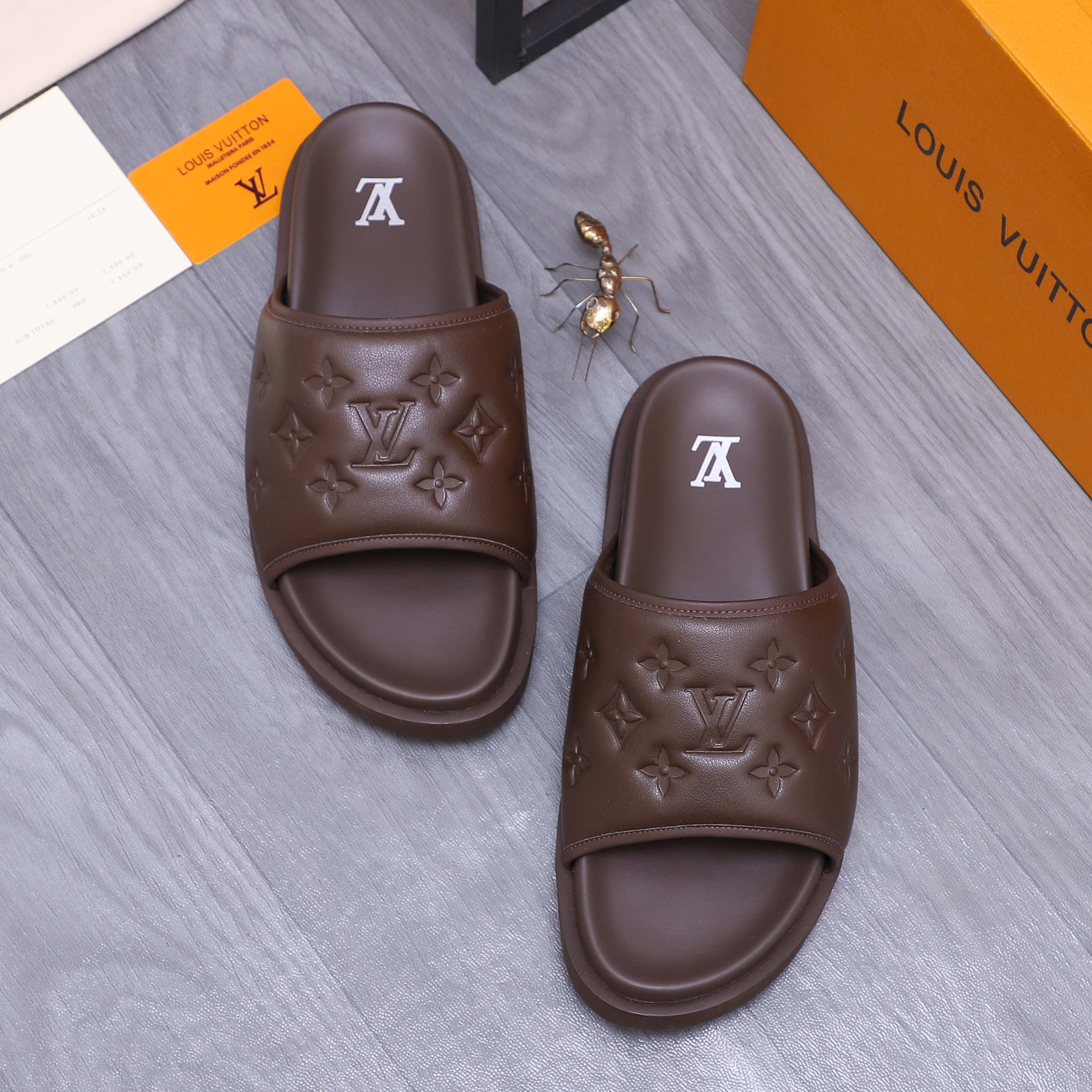 Louis Vuitton Men's Embossed Leather Slide Sandals, Comfortable & Stylish 3 a1744769402519 3676