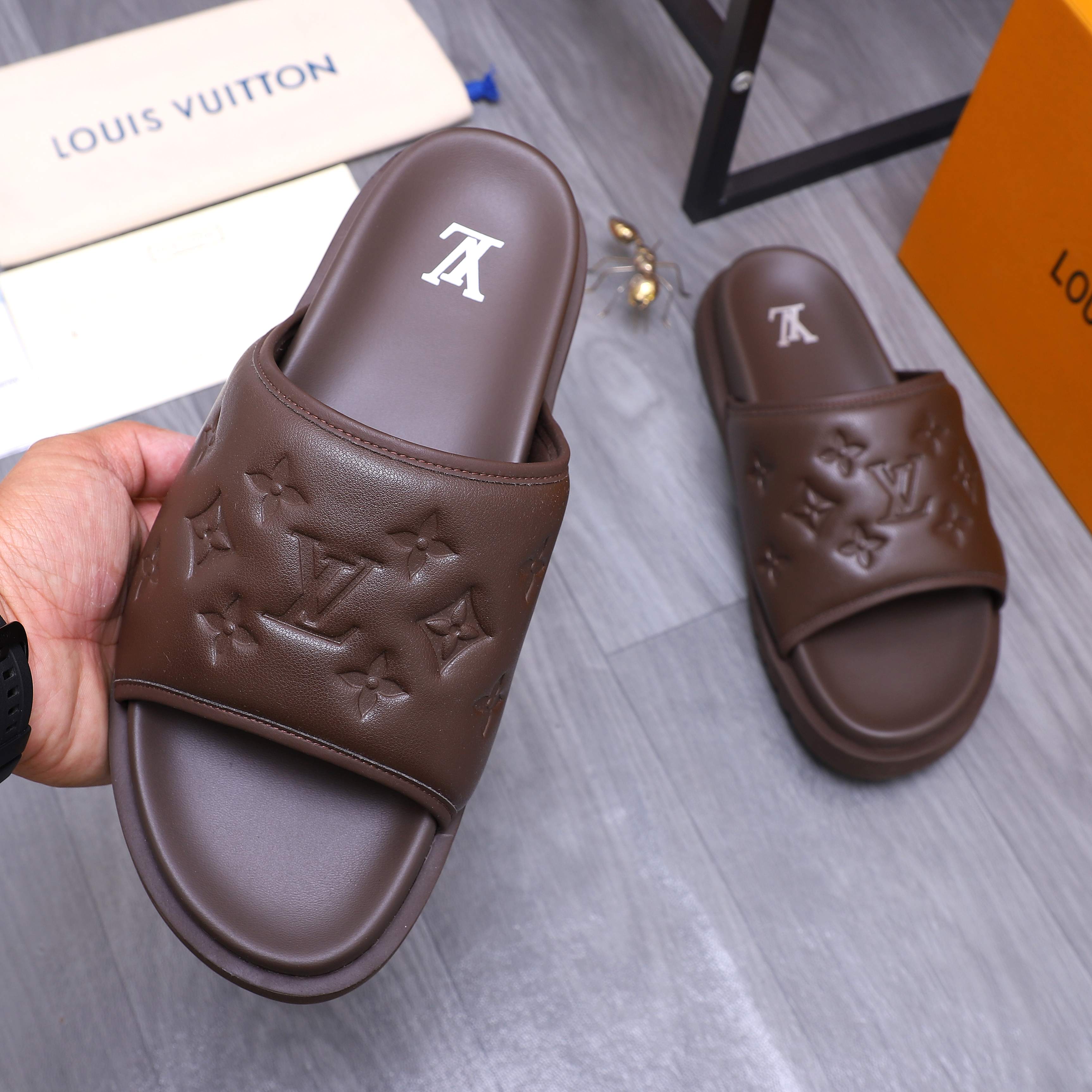 Louis Vuitton Men's Embossed Leather Slide Sandals, Comfortable & Stylish 6 a1744769404956 7757