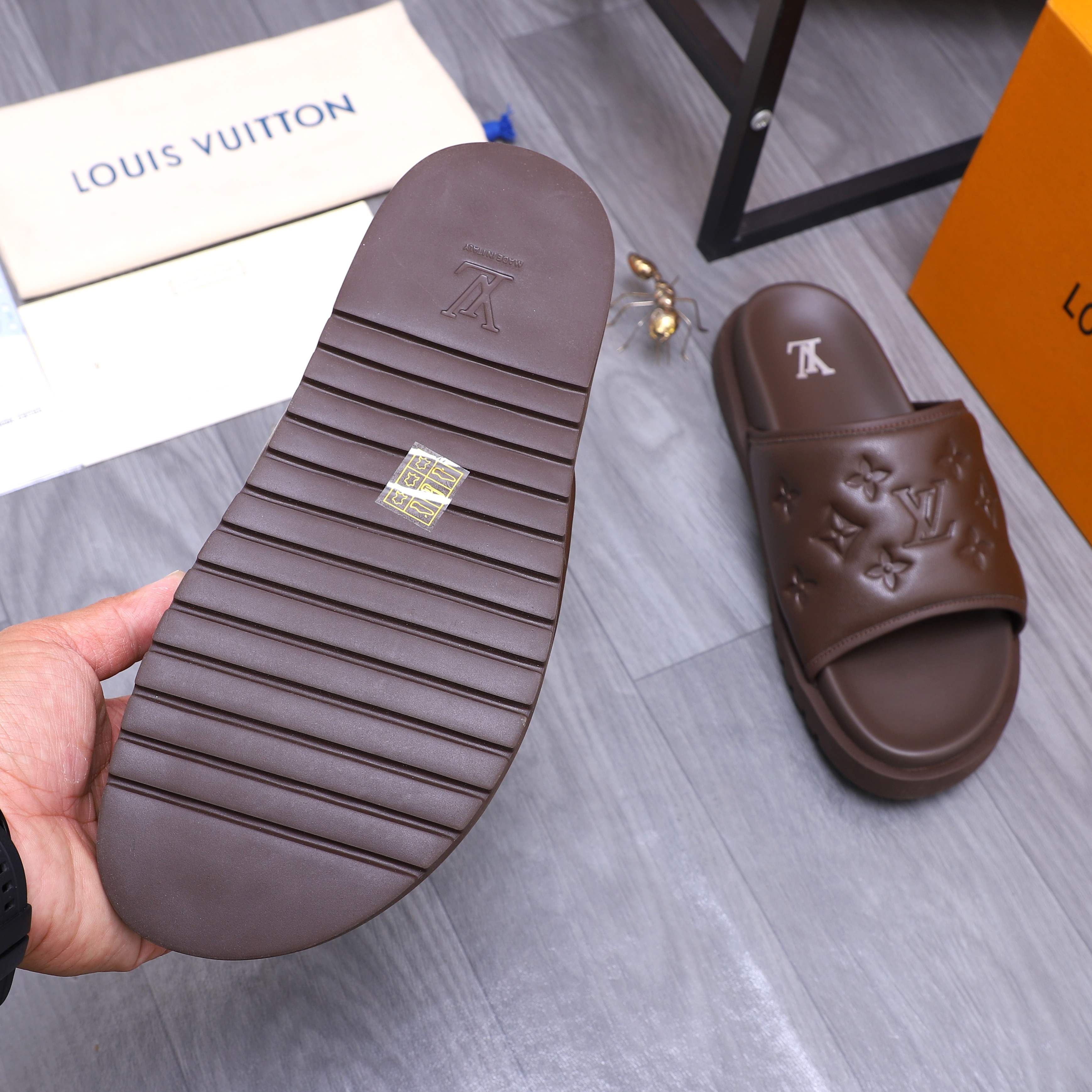 Louis Vuitton Men's Embossed Leather Slide Sandals, Comfortable & Stylish 9 a1744769405027 0330