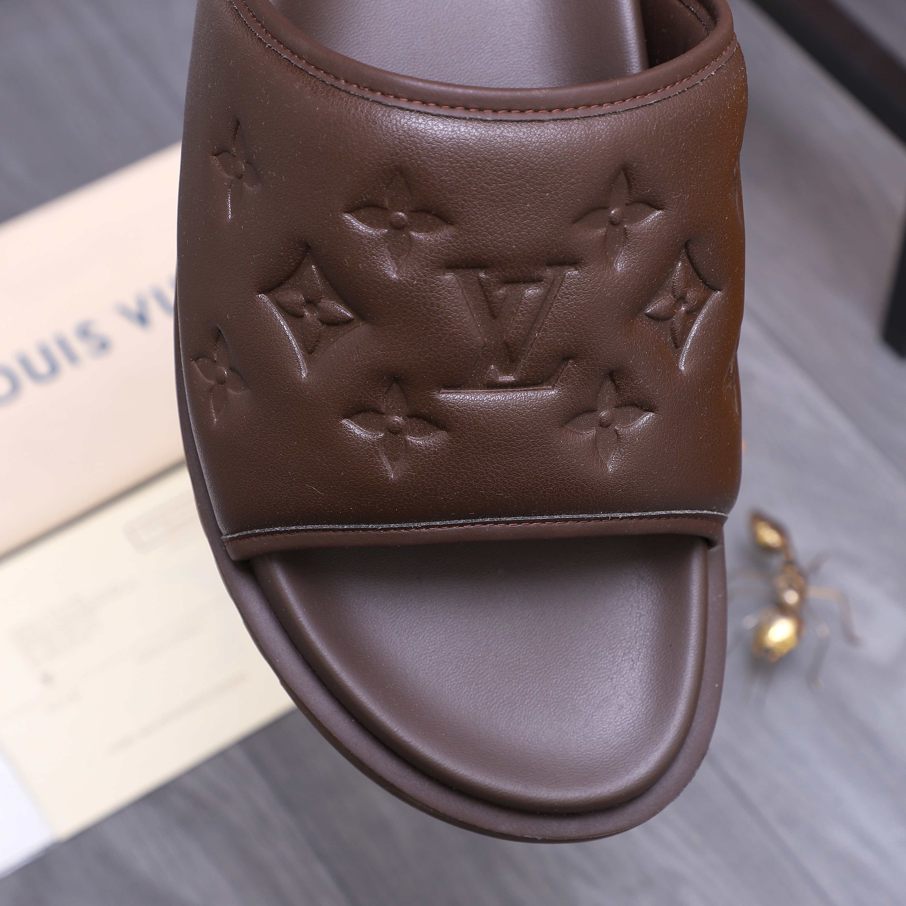 Louis Vuitton Men's Embossed Leather Slide Sandals, Comfortable & Stylish 10 a1744769405462 3441