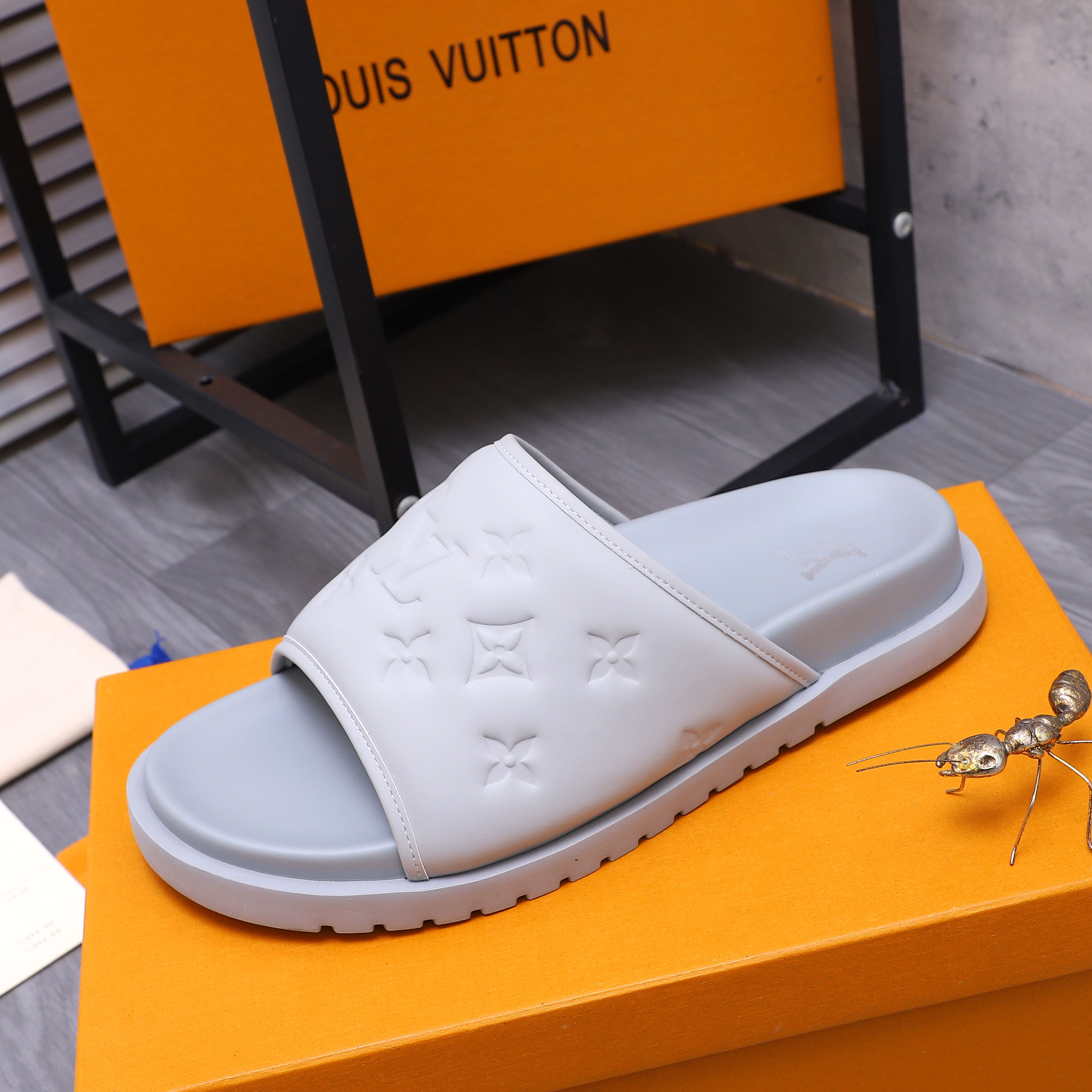 Louis Vuitton Men's Embossed Leather Slide Sandals, Multiple Colors Available 7 a1744769633344 2472