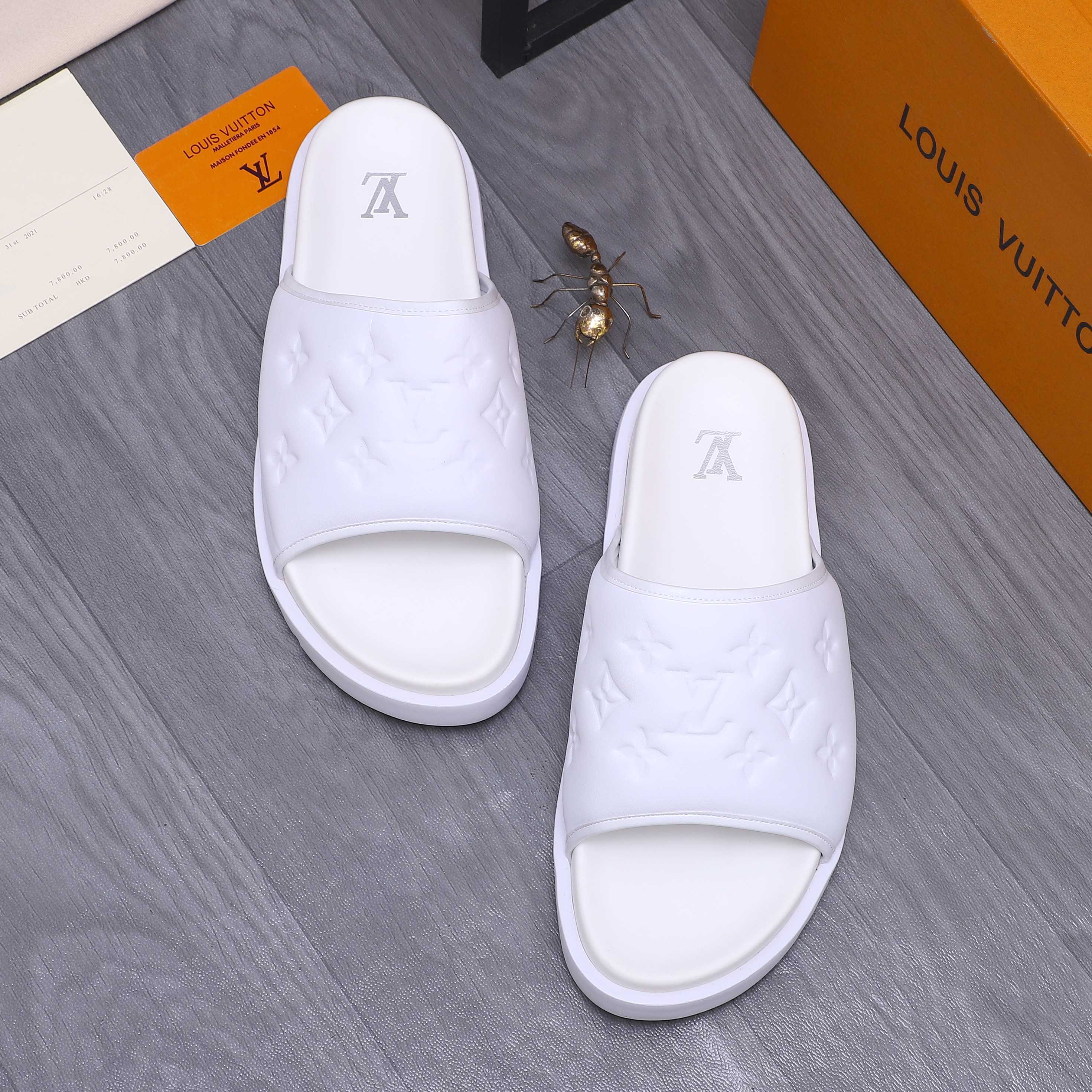 Louis Vuitton Men's Classic Embossed Leather Slides Sandals, Multiple Colors 3 a1744769799751 2068