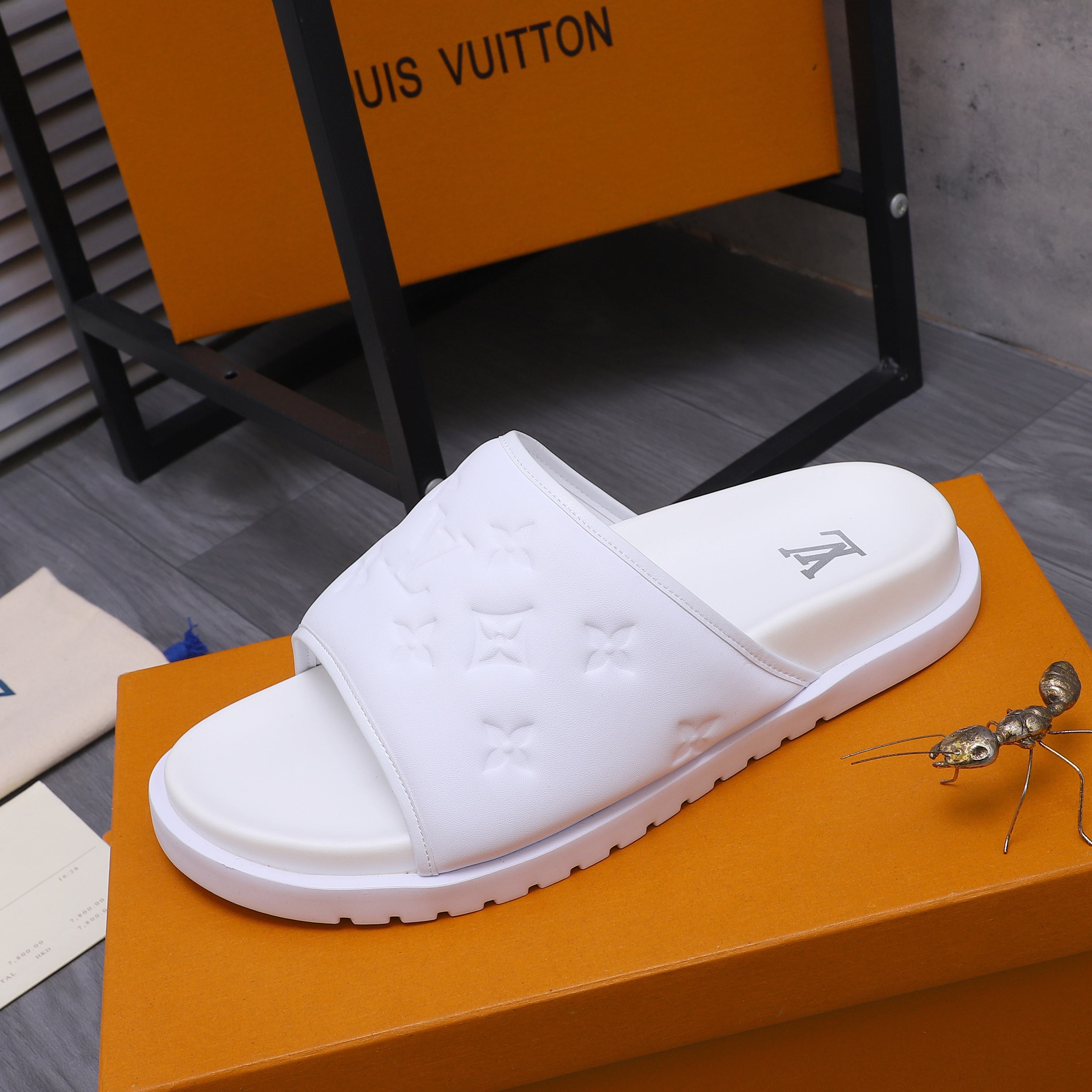 Louis Vuitton Men's Classic Embossed Leather Slides Sandals, Multiple Colors 7 a1744769801586 1176