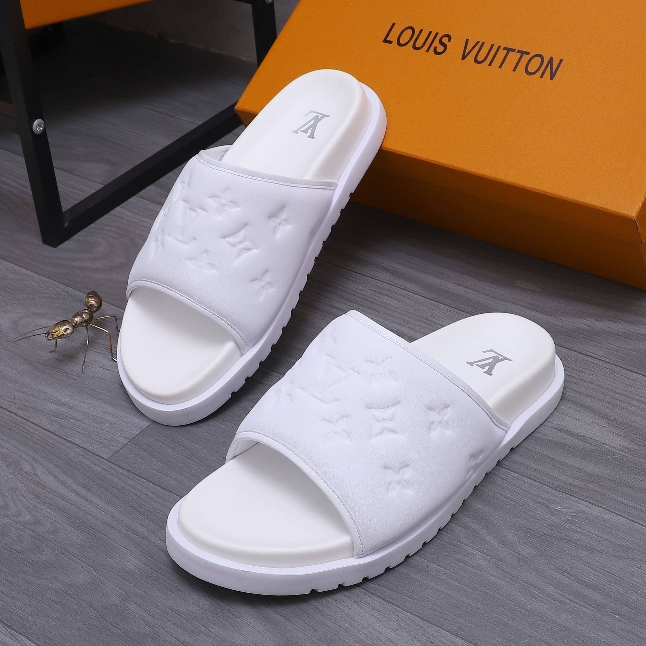 Louis Vuitton Men's Classic Embossed Leather Slides Sandals, Multiple Colors 5 a1744769802726 4718