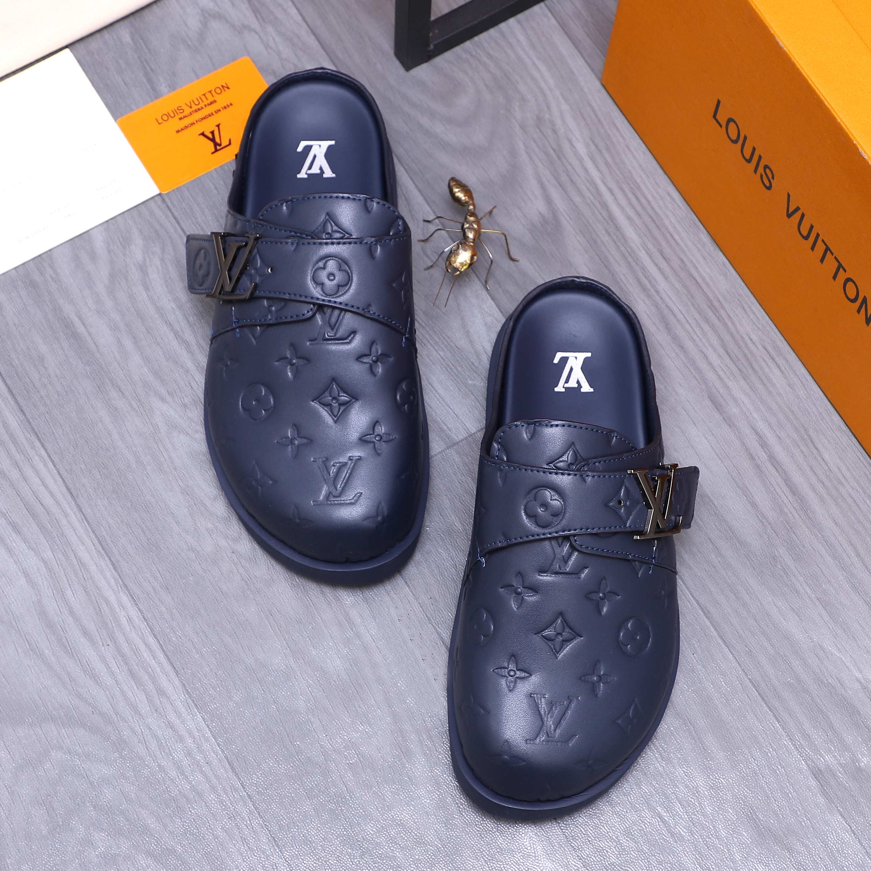 Louis Vuitton Men's Monogram Embossed Leather Mule Slides 3 a1744783658327 7620