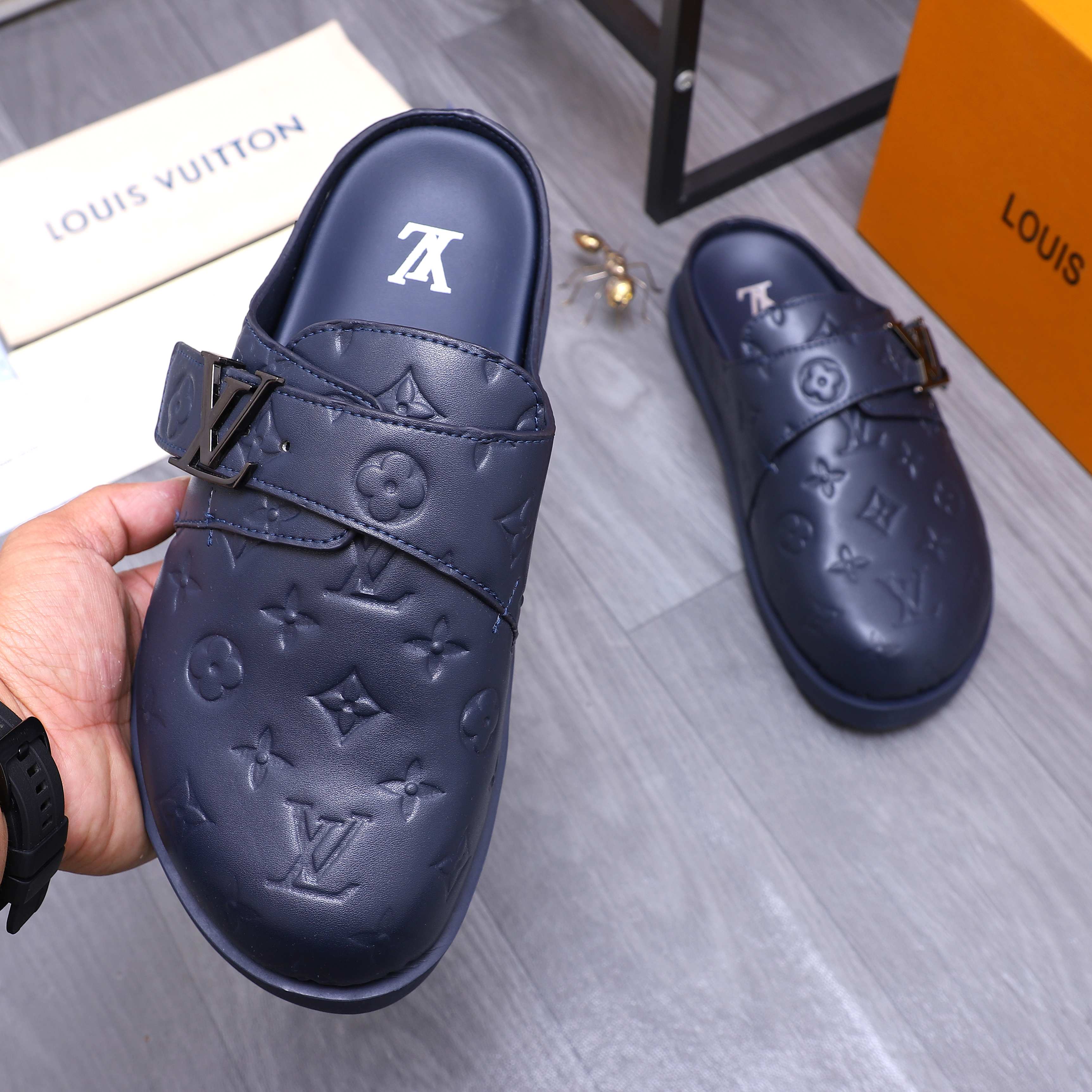 Louis Vuitton Men's Monogram Embossed Leather Mule Slides 6 a1744783658584 5282