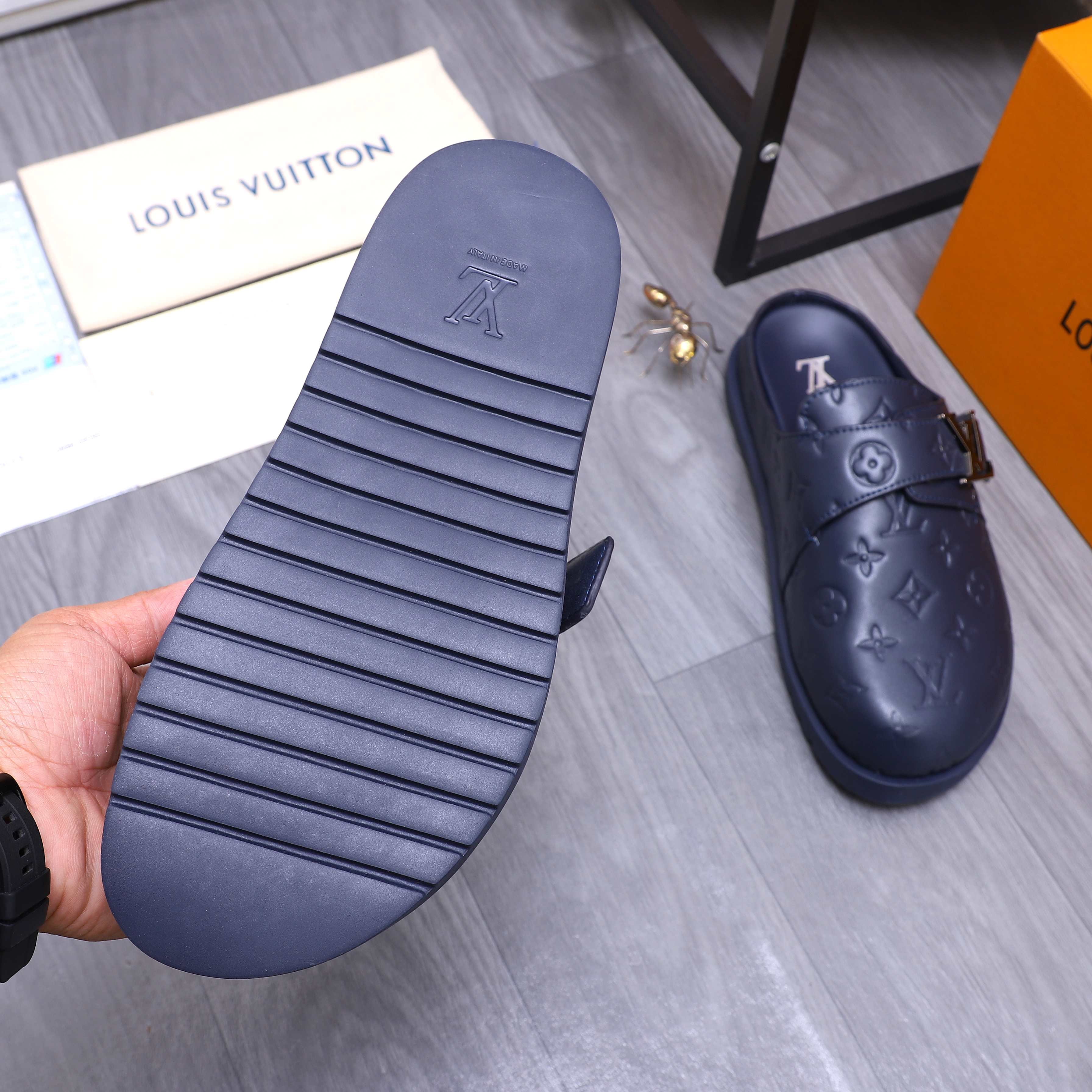 Louis Vuitton Men's Monogram Embossed Leather Mule Slides 9 a1744783661101 5662