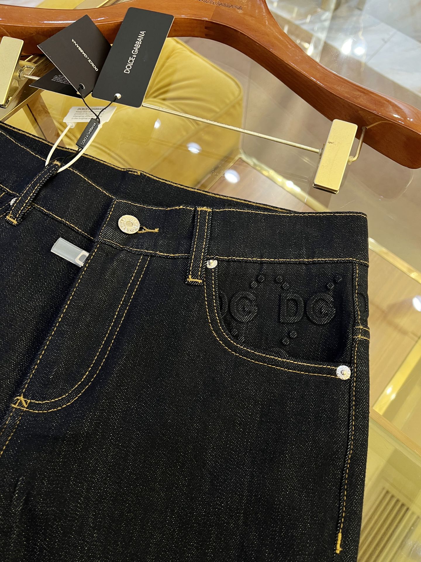 Dolce & Gabbana Slim-Fit Denim Jeans with Embossed Logo Details 8 i1737642349235 8916 0 9