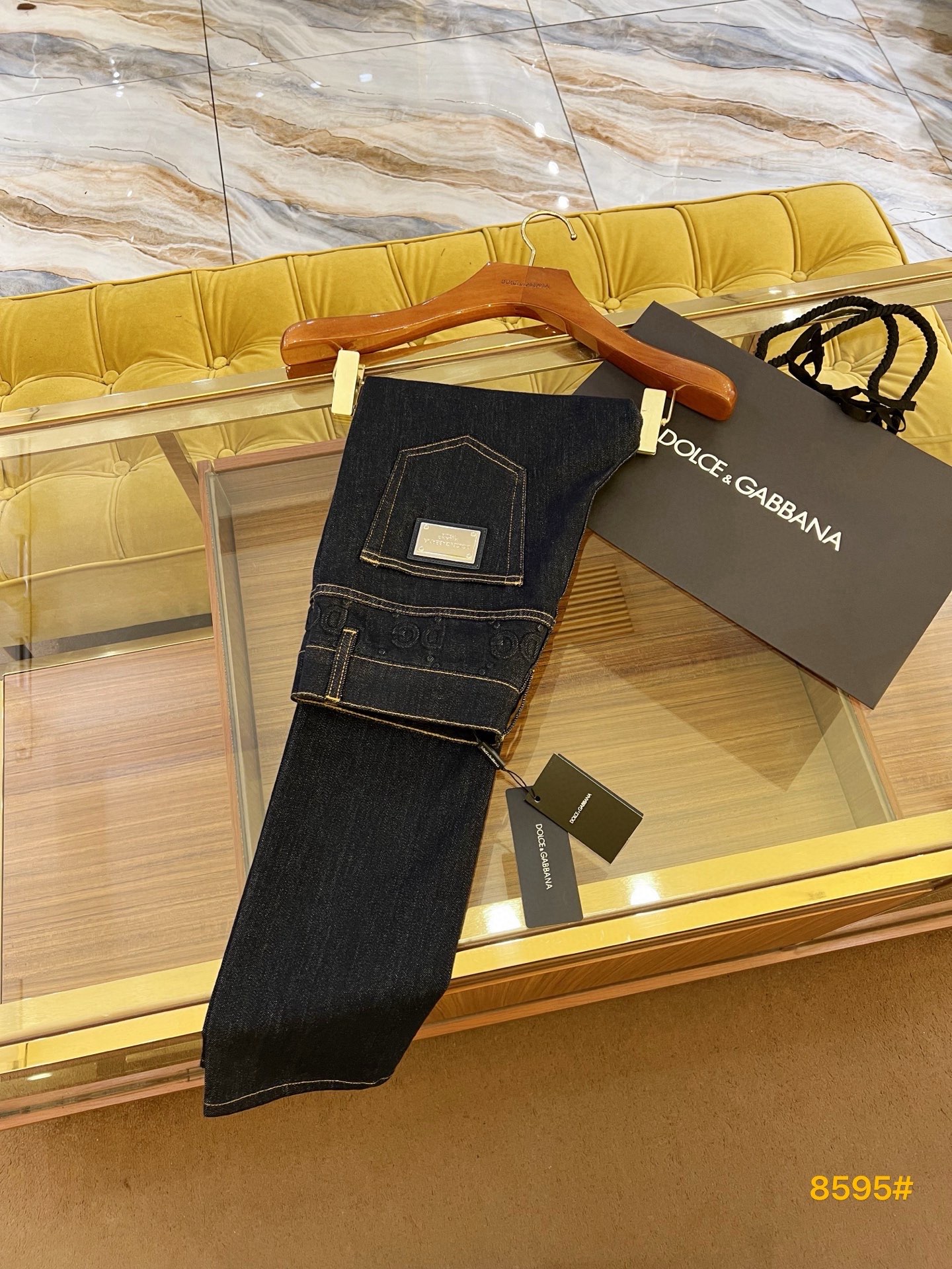 Dolce & Gabbana Slim-Fit Denim Jeans with Embossed Logo Details 2 i1740682812207 2517 0 6
