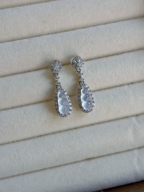 Silver-set natural light photo: High-ice, sparkling lucky bean drop earrings
