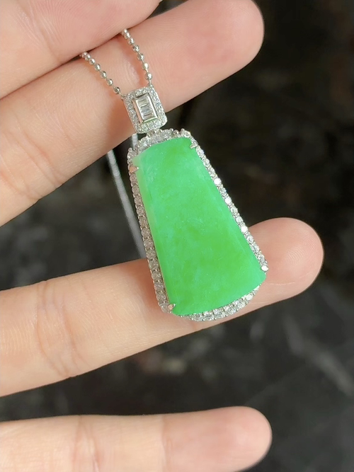 Silver-inlaid, natural light photography: Ice-textured, bright green, plain pendant