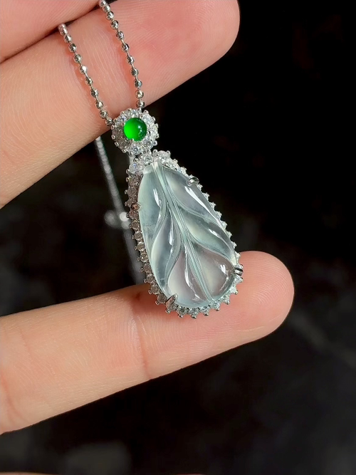 Silver-encased natural light photo: high ice fluorescence leaf pendant