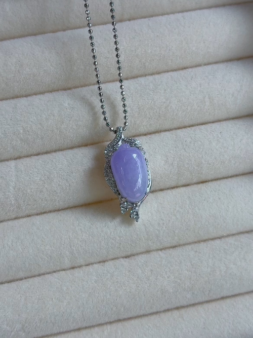 Silver-set, natural light photo: Icey lavender melon pendant