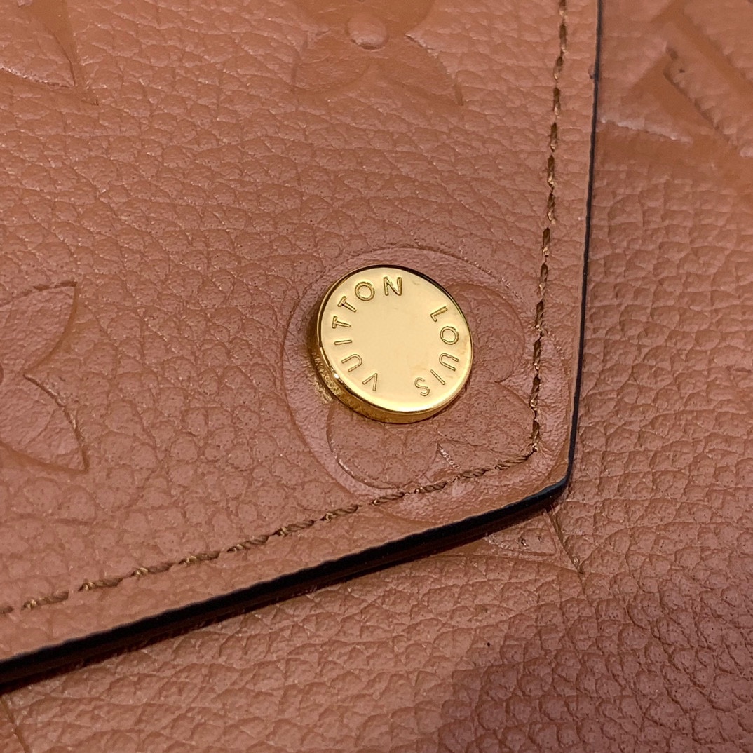 Louis Vuitton Monogram Empreinte Leather Victorine Wallet - Rose 5 i1727614721 3591 0