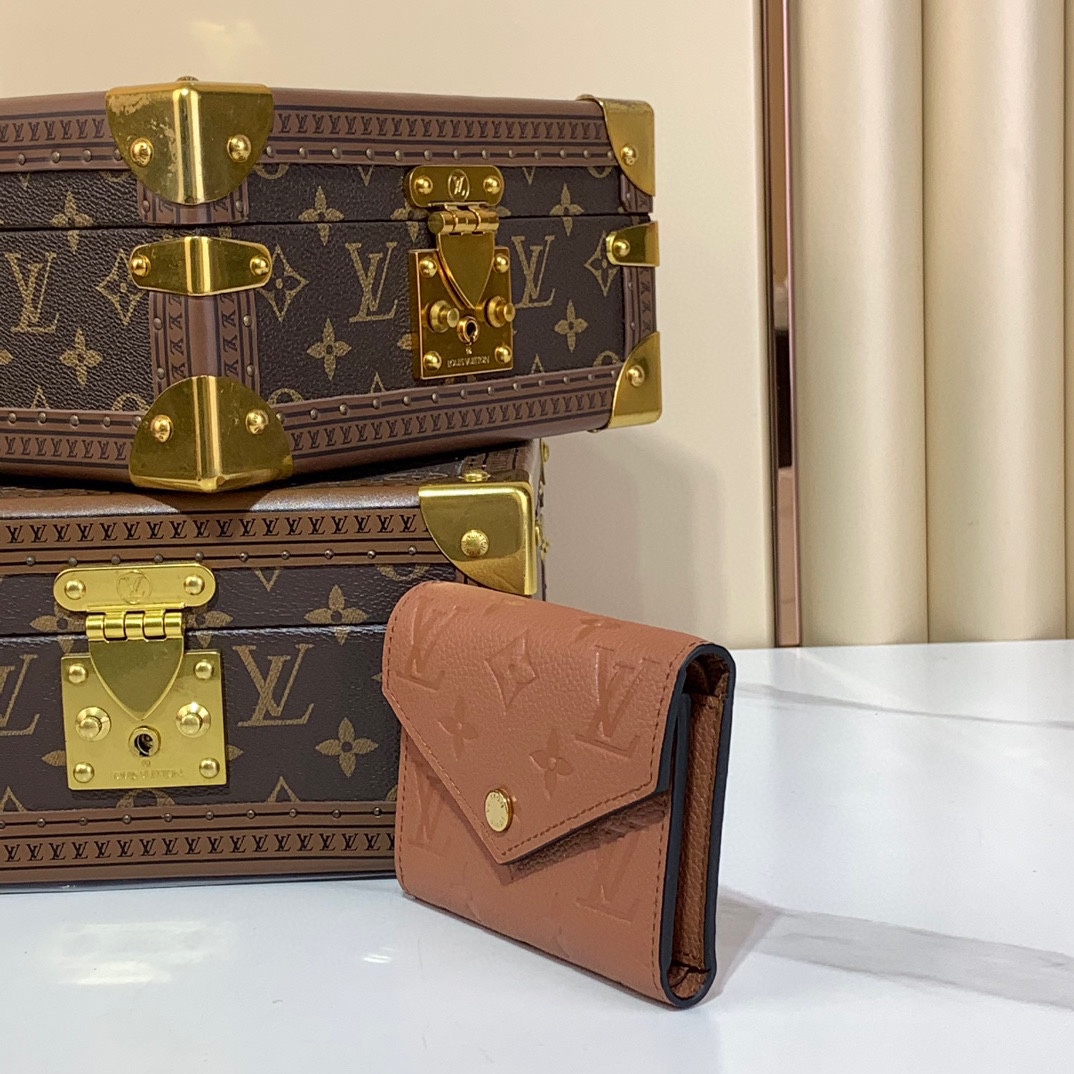 Louis Vuitton Monogram Empreinte Leather Victorine Wallet - Rose 4 i1727614721 4308 8