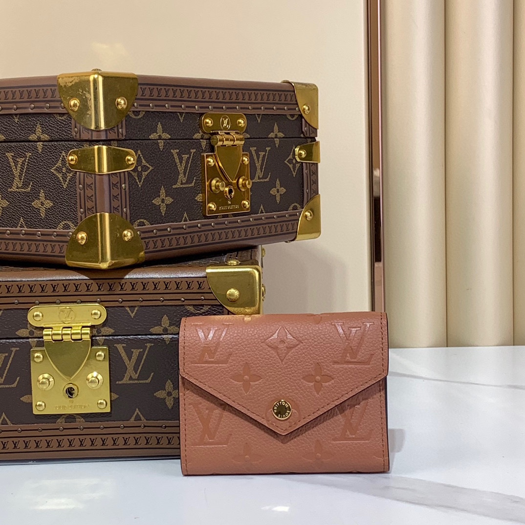 Louis Vuitton Monogram Empreinte Leather Victorine Wallet - Rose 2 i1727614721 4642 1