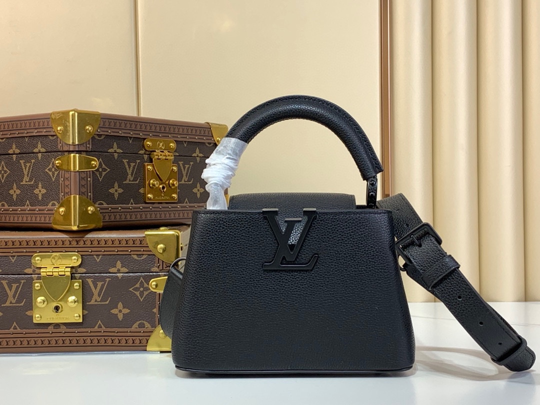 Las mejores marcas como
 Louis Vuitton LV Capucines Bolsos de mano Negro Blanco Taurillon Cuero de vaca Mini M25255