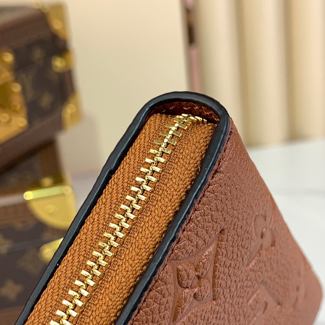 Louis Vuitton Monogram Empreinte Leather Zippy Coin Purse - M12760 6 i1730647972 1137 6