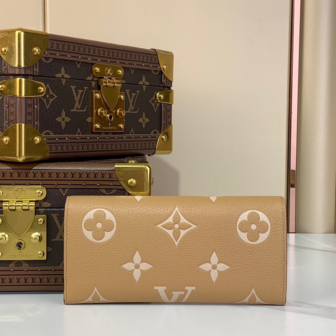 Louis Vuitton Emilie Wallet Monogram Empreinte Leather Apricot 3 i1731933866 1896 7