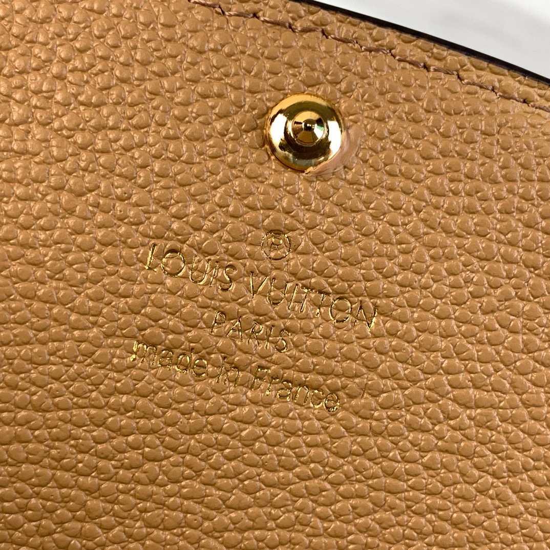 Louis Vuitton Emilie Wallet Monogram Empreinte Leather Apricot 8 i1731933866 2043 6