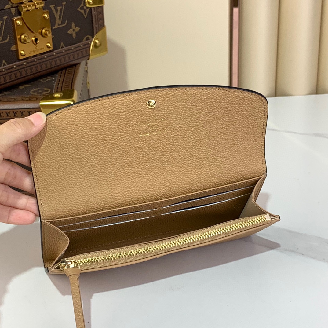 Louis Vuitton Emilie Wallet Monogram Empreinte Leather Apricot 7 i1731933866 8439 3