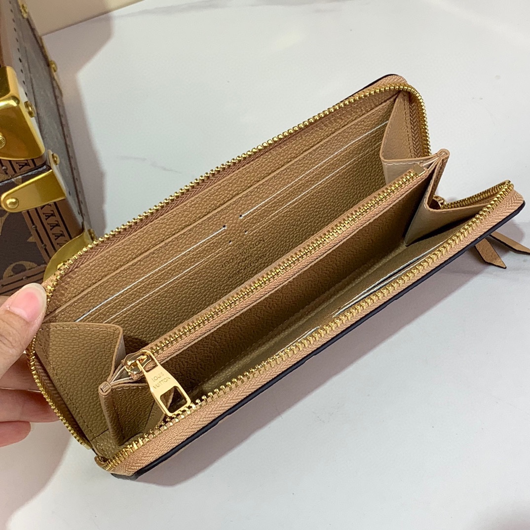 Louis Vuitton Monogram Empreinte Leather Zippy Wallet - Apricot 8 i1731933974 2305 0