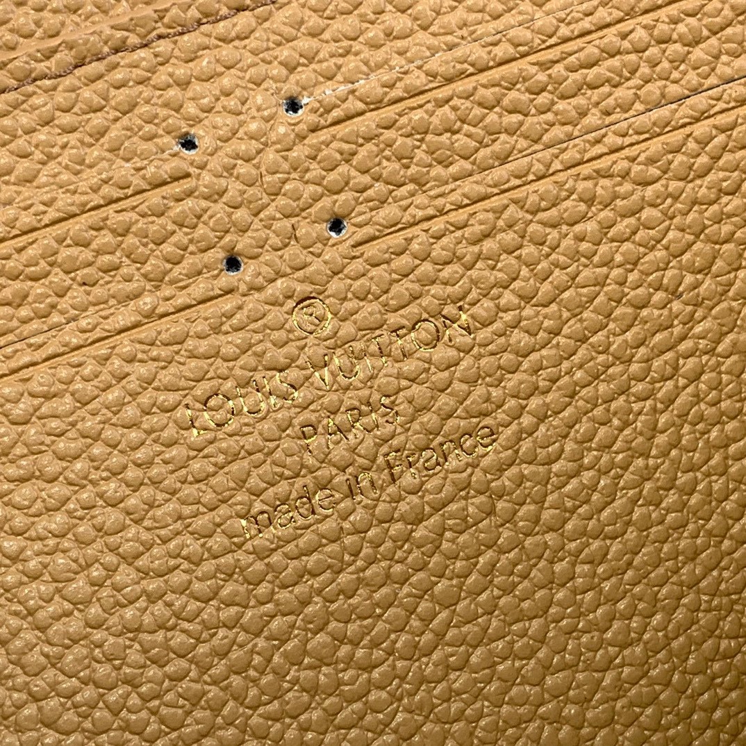 Louis Vuitton Monogram Empreinte Leather Zippy Wallet - Apricot 9 i1731933974 6963 4
