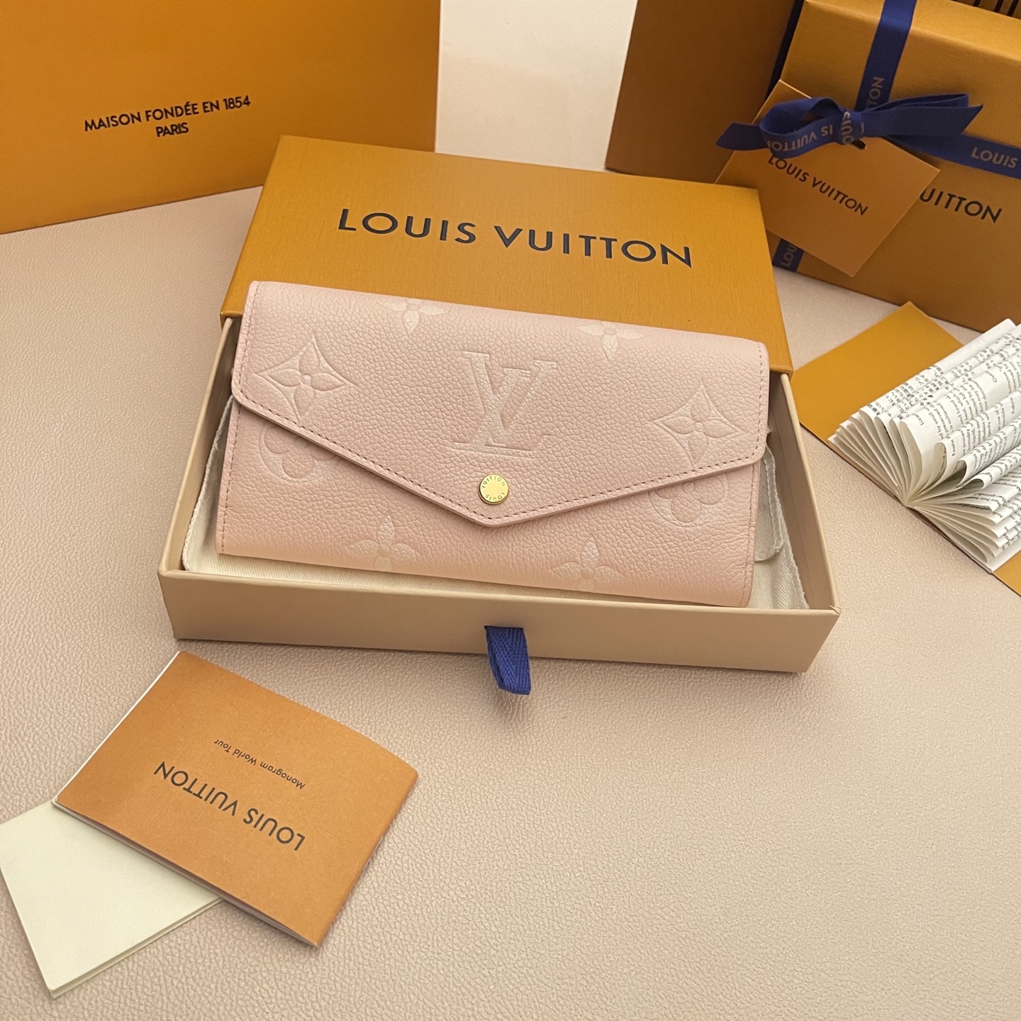 Louis Vuitton Sarah Wallet in Monogram Empreinte Leather, Pink, 19 x 10.5 cm 2 i1741017710099 659 0 0