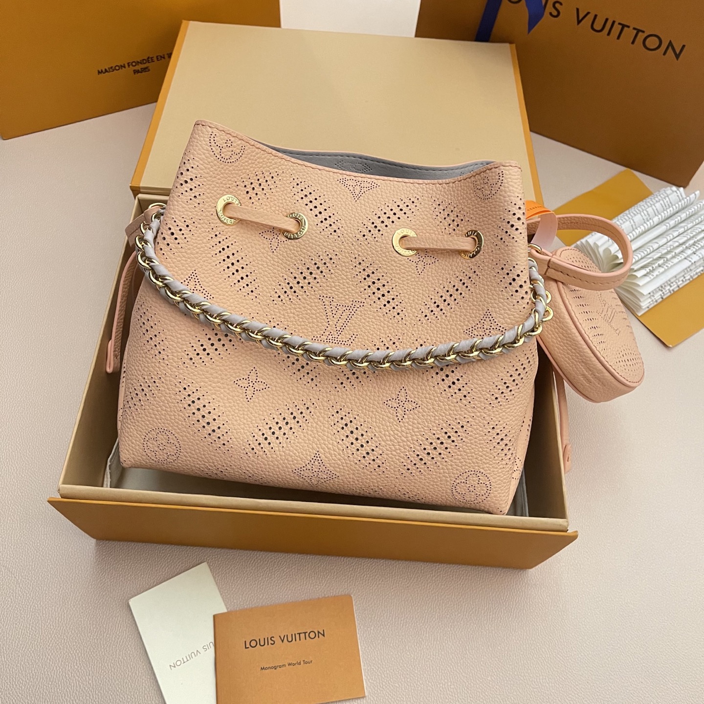 Louis Vuitton Bella Bucket Bag in Mahina Leather with Chain Detail 1 i1741274410796 8128 0 0