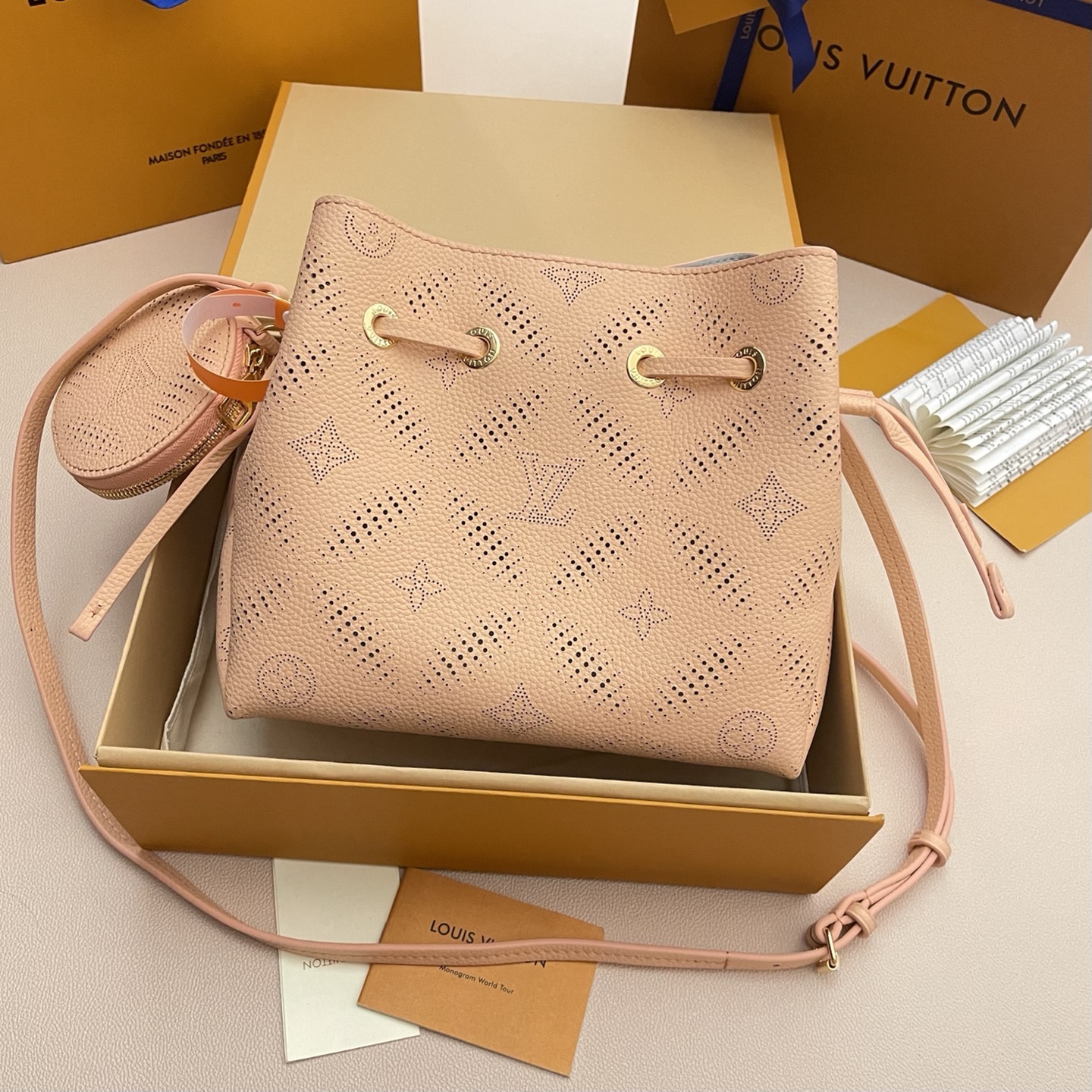 Louis Vuitton Bella Bucket Bag in Mahina Leather with Chain Detail 2 i1741274410809 4781 0 1