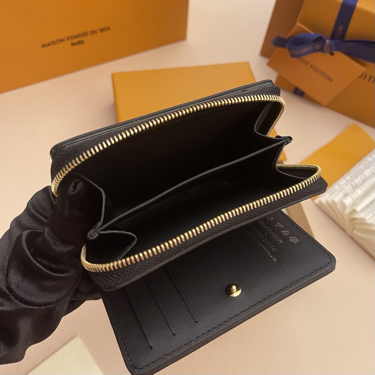 Louis Vuitton Lisa Wallet: Monogram Embossed Leather Zip-Around Wallet 10 i1742751334628 4182 0 8