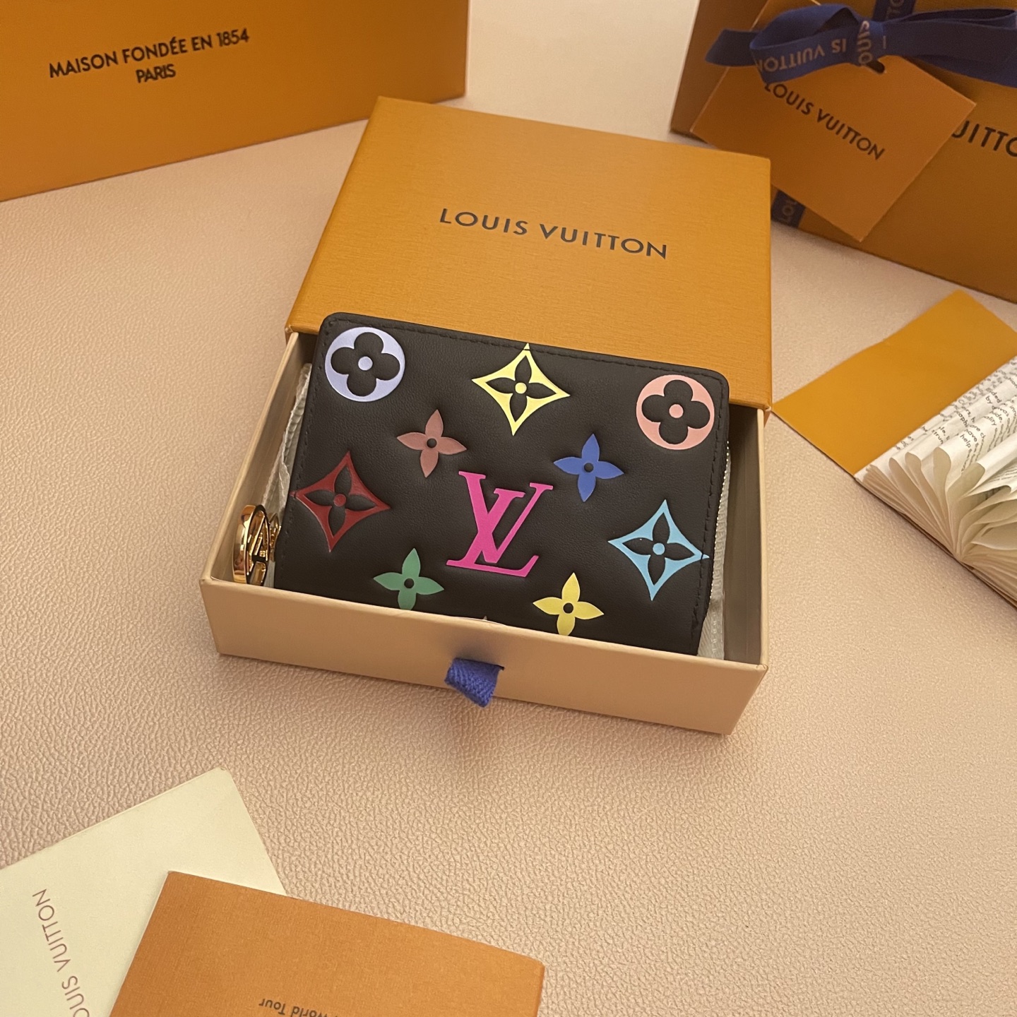 Louis Vuitton Lisa Wallet: Monogram Embossed Leather Zip-Around Wallet 2 i1742751334651 5420 0 0