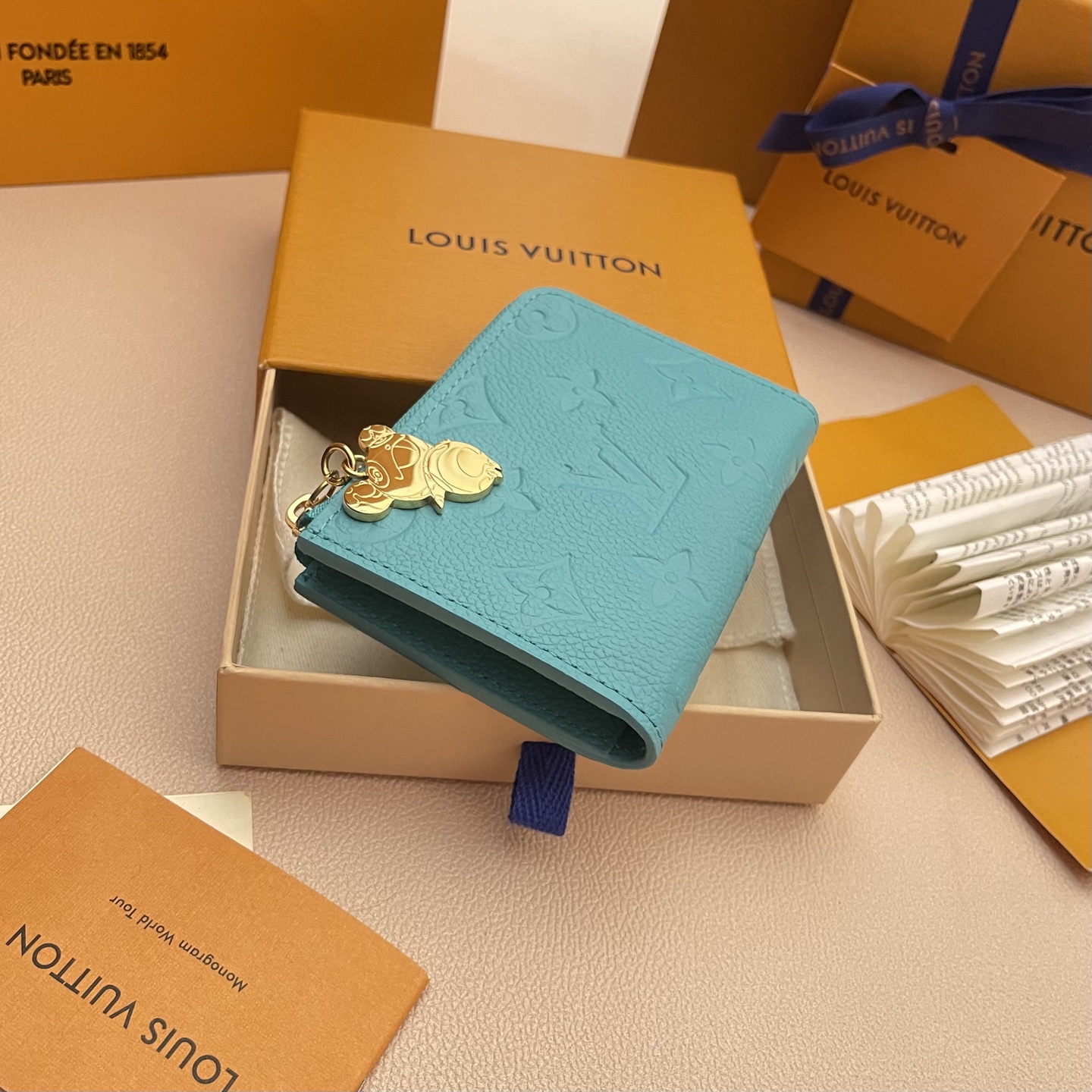 Louis Vuitton Takashi Compact Wallet Blue Monogram Leather 3 i1742752799675 8963 0 3