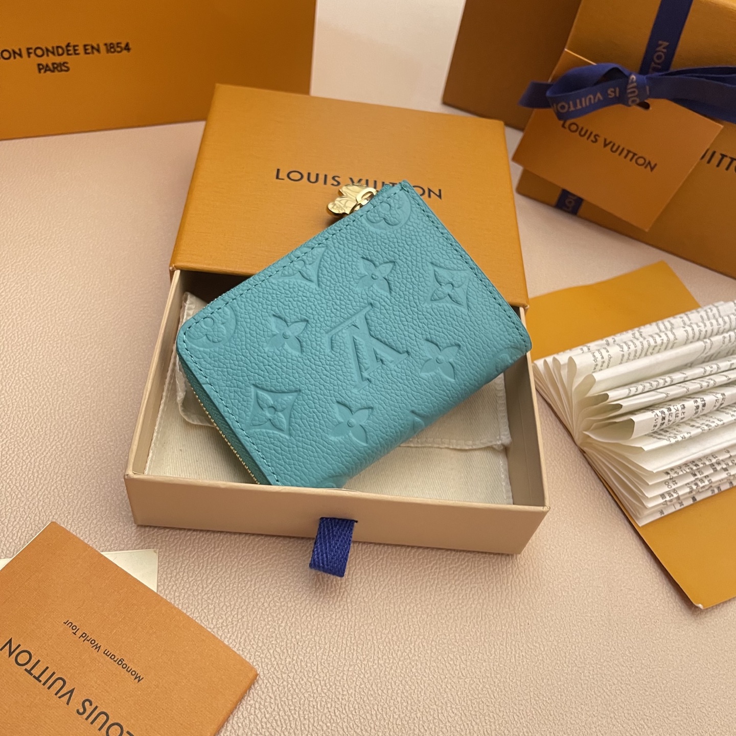 Louis Vuitton Takashi Compact Wallet Blue Monogram Leather 2 i1742752799859 9308 0 2