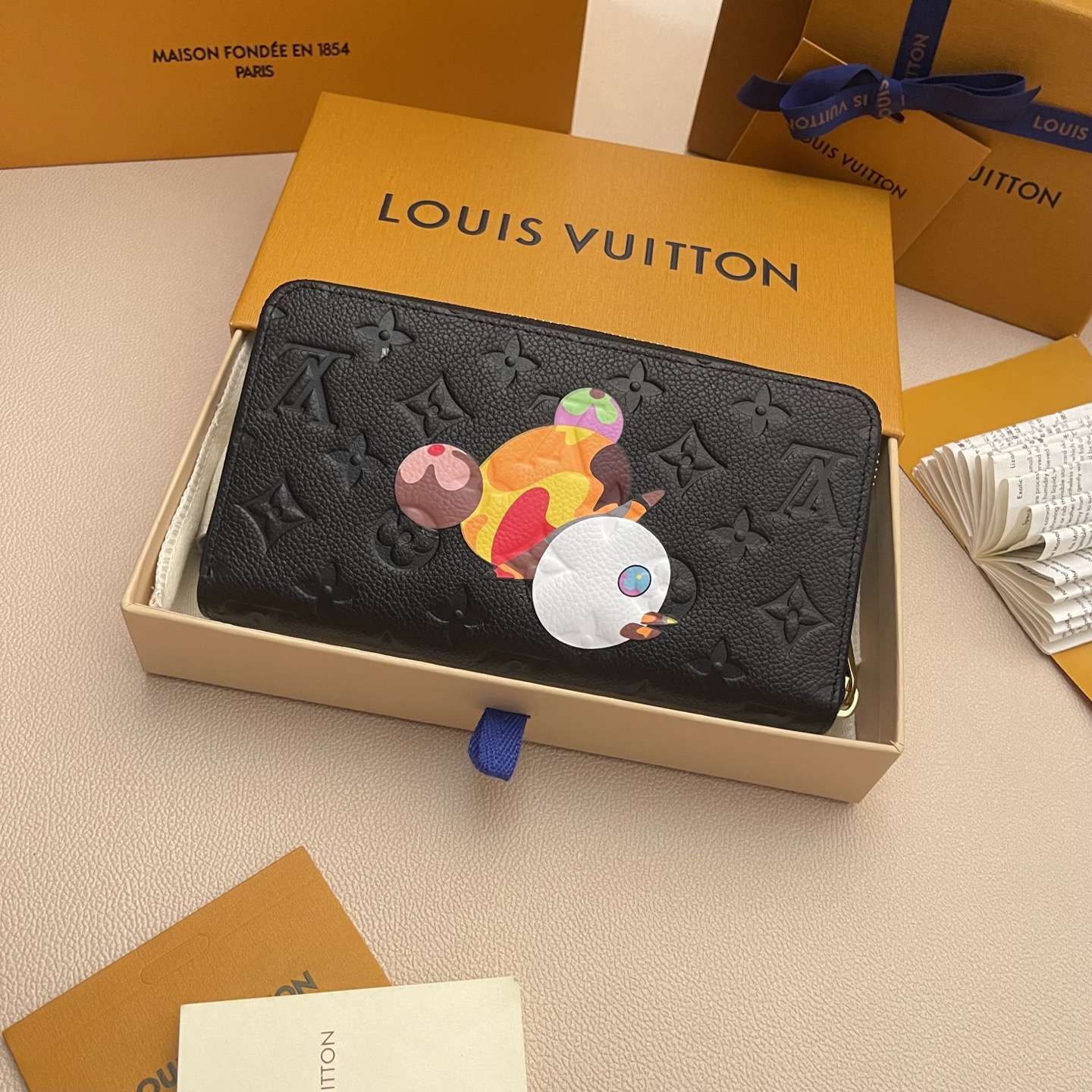 Louis Vuitton Black Monogram Embossed Zippy Wallet with Cartoon 3 i1743087392697 3905 0 1